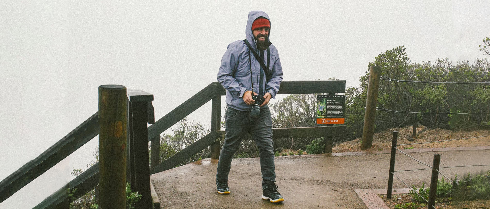 Photographer Emanuel Desousa walking outdoors in Oakland.