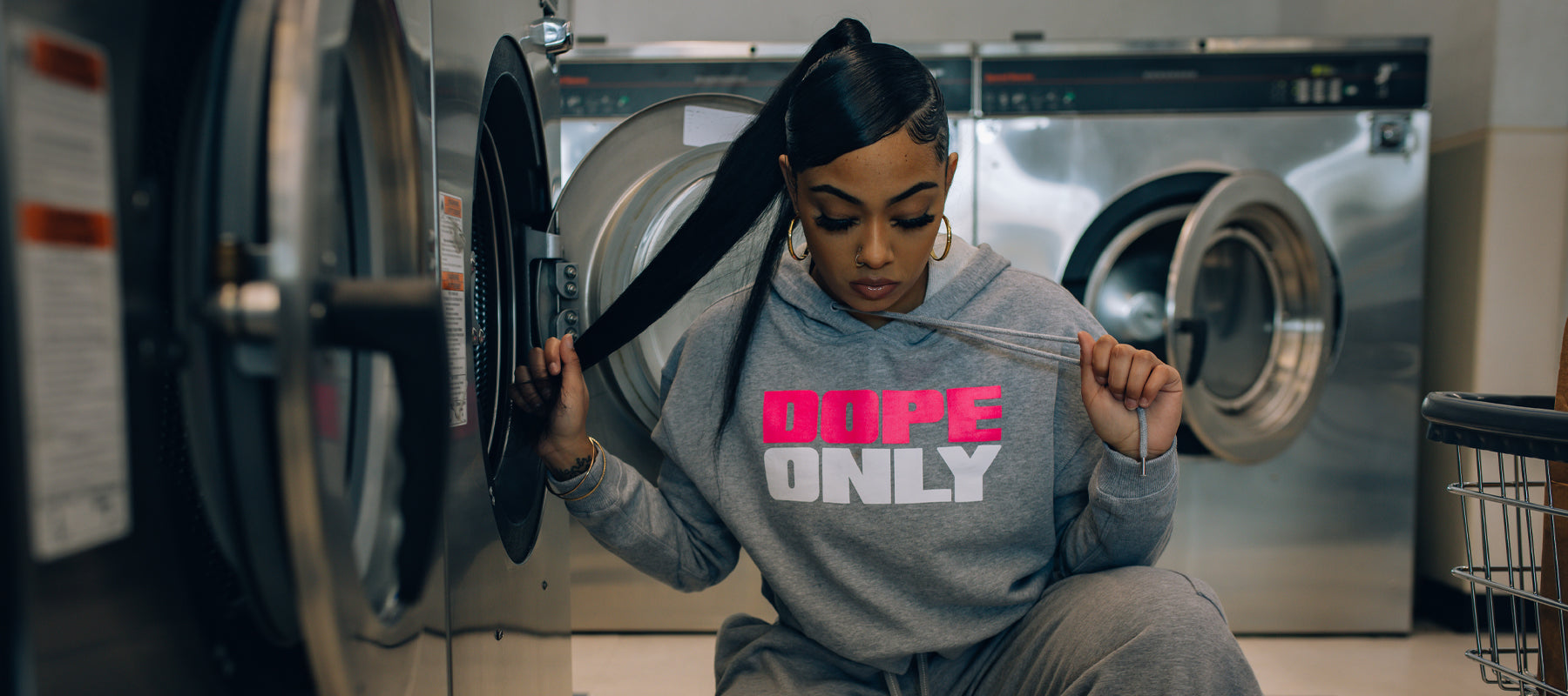 Female model wearing women's DopeOnly original crop hoodie.