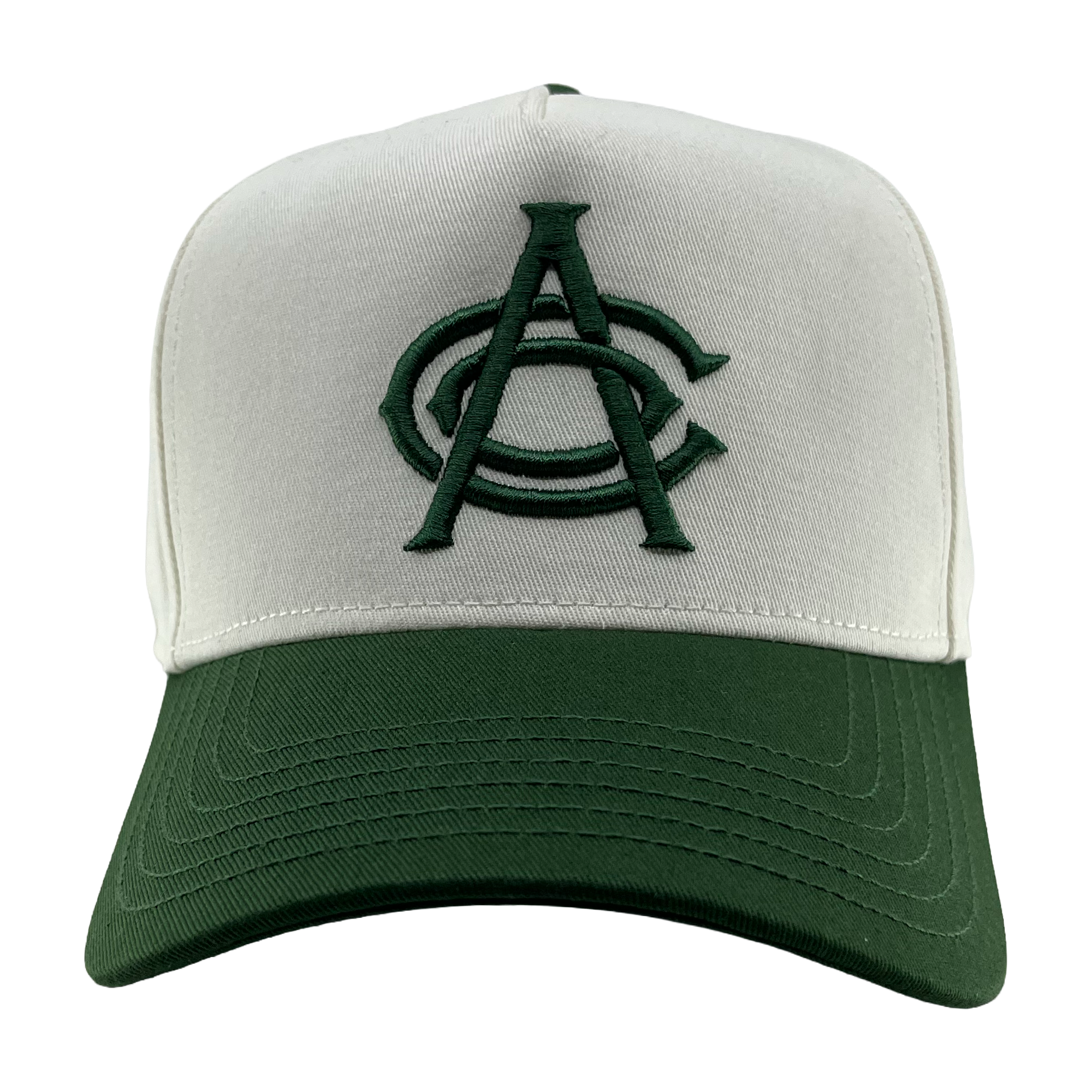 The OAC Logo 5 Panel by OAC is a baseball snapback cap featuring a white front panel and a green bill. The cap displays an embroidered green Oakland Athletic Club logo with two overlapping letters, “A” and “C,” on the front. The background is plain white.