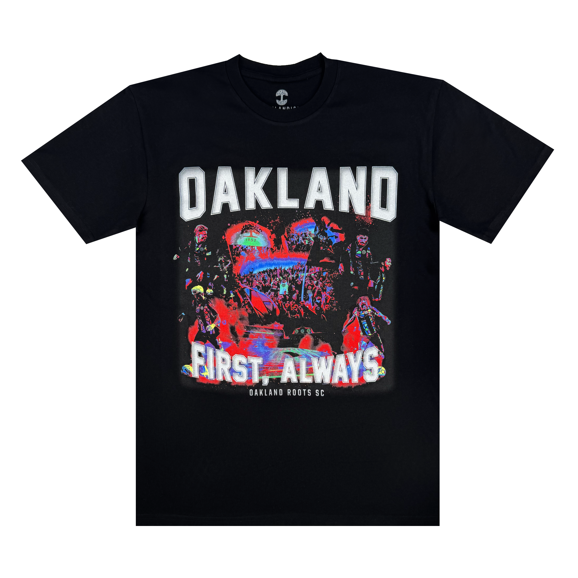 The OFA Tour Tee by Oakland Roots SC is a black T-shirt featuring "OAKLAND" in bold white letters, colorful abstract art of people and urban elements, and the phrases "FIRST. ALWAYS" and "Oakland Roots SC," highlighting the sports club's dedication to social good.