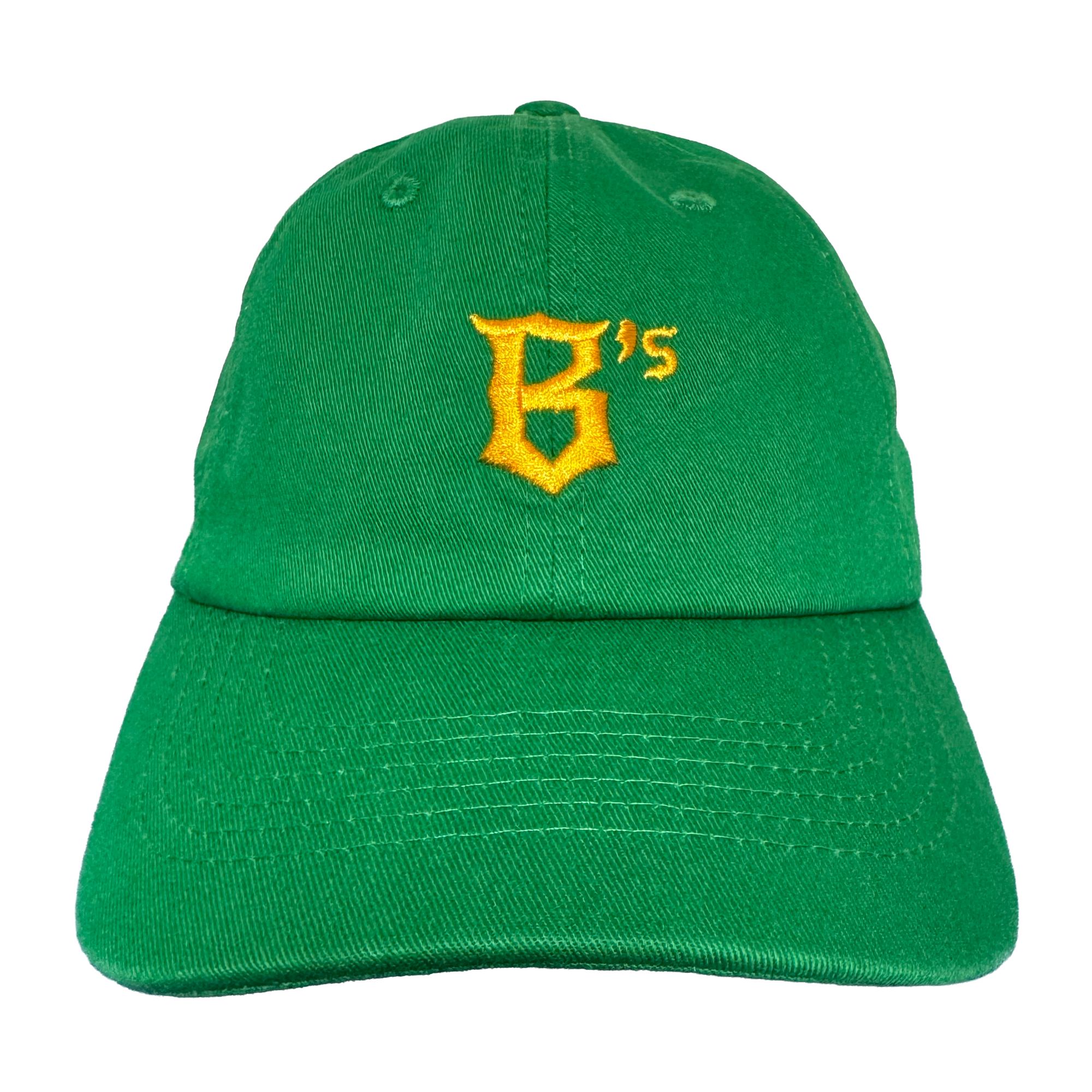 The Oakland Ballers Dad Hat features a green design with a yellow embroidered "B's" on the front, visible stitching, and a curved brim. The cap is photographed against a plain white background. Brand: Oakland Ballers.