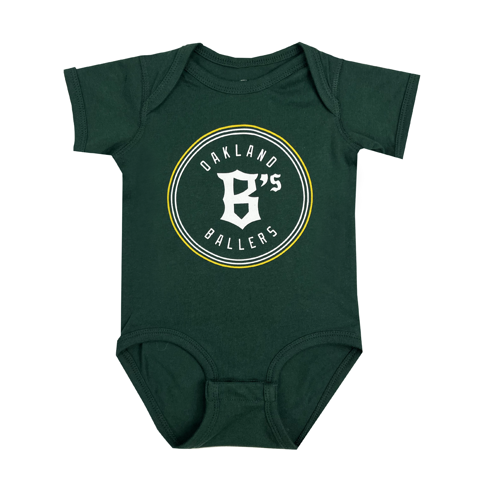The Infant Oakland Ballers Logo One-Piece is a small, green baby onesie with short sleeves. The front showcases the "OAKLAND B'S BALLERS" logo, emphasizing their West Coast franchise. The logo features thin yellow, gray, and white concentric circles. For convenience, the onesie includes two snaps on each shoulder and three snaps at the bottom for easy dressing.
