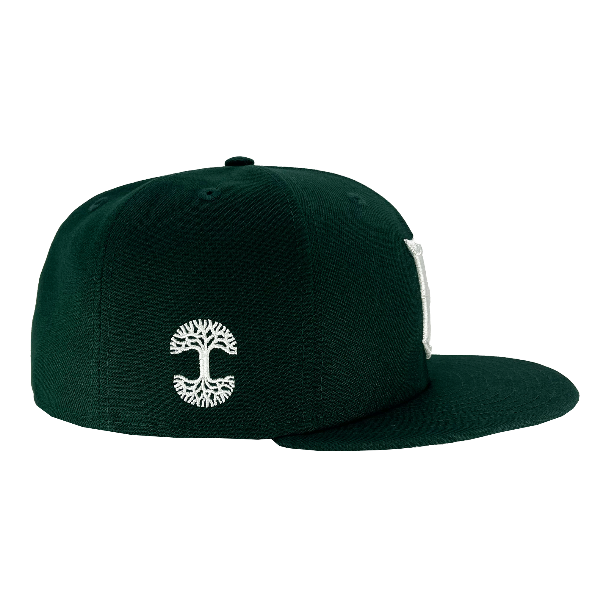 Wearer's right view of Oaklandish Tree logo on New Era 59FIFTY Dark Green Oakland Ballers fitted. 