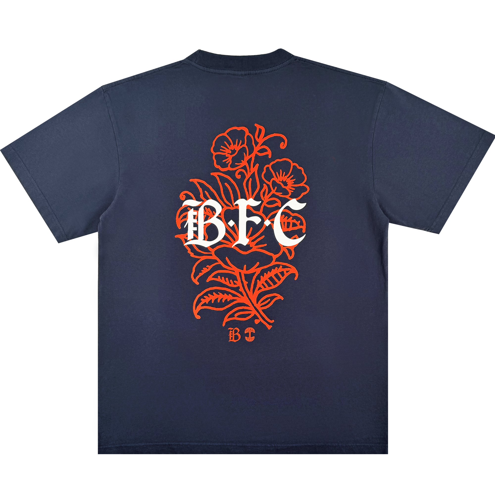 The Bay FC Flora Tee by Bay FC is a navy blue, classic fit shirt made from heavy-weight cotton. The back displays a large orange floral design with bold white "BFC" lettering and a small "BFC" below, celebrating Bay FC style.