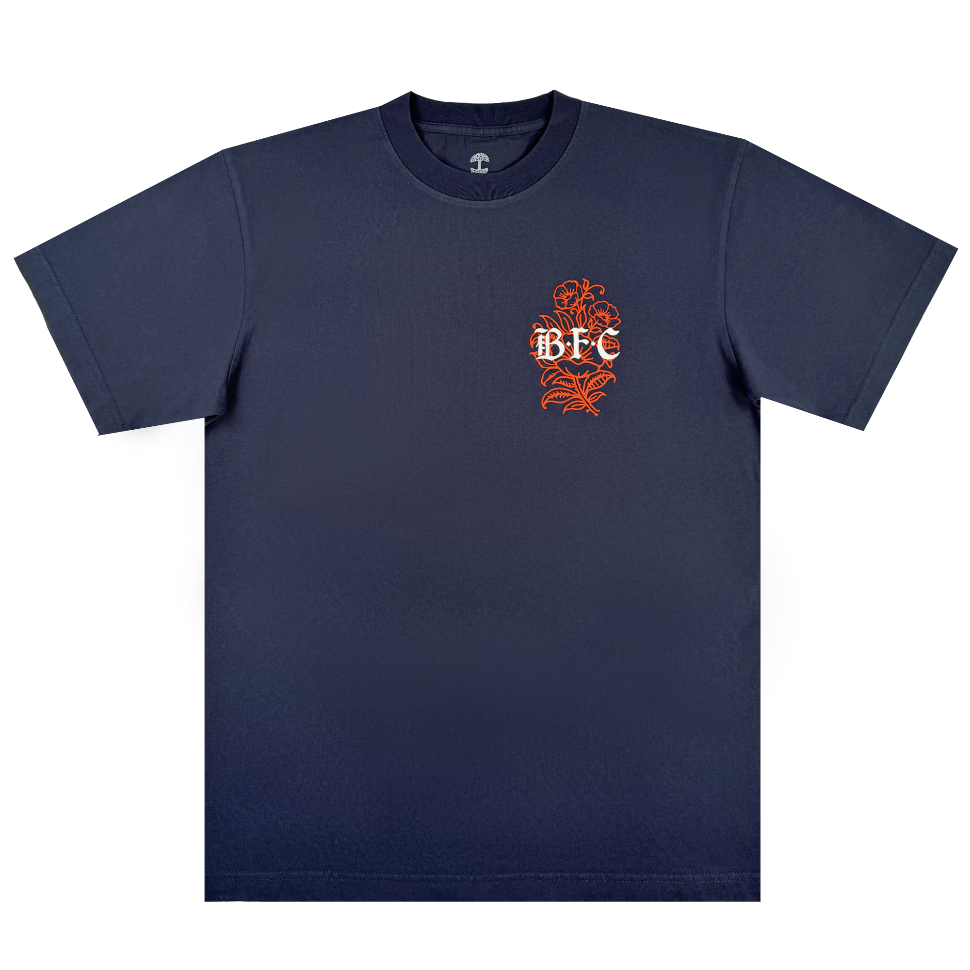 The Bay FC Flora Tee by Bay FC is a navy classic fit heavyweight cotton t-shirt featuring a small orange floral design and white "BFC" text on the left chest, laid flat on a plain white background.