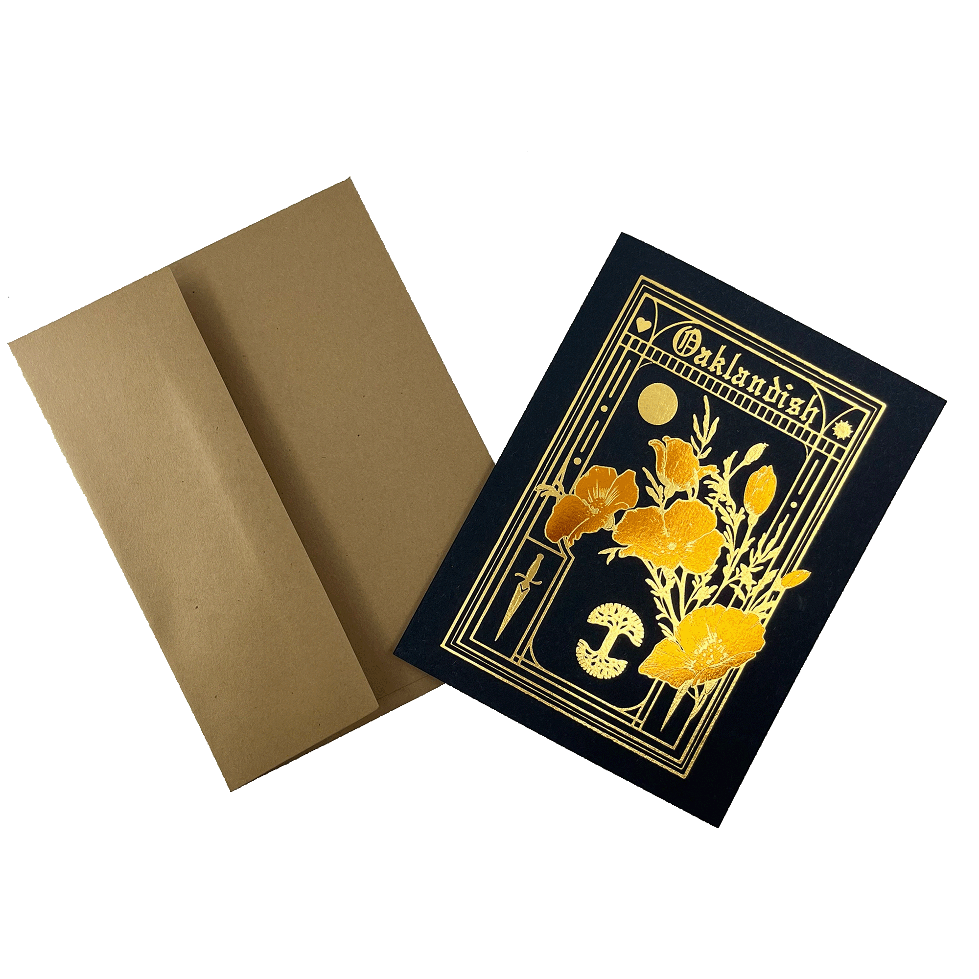 An elegant Blossom Card by Never Elsewhere, featuring a sophisticated black design with a gold-foil arrangement of flowers, mushrooms, a book, and a moon within a rectangular border. The word "Outlandish" is displayed at the top. This charming greeting card comes with a plain brown envelope made from recycled kraft paper.