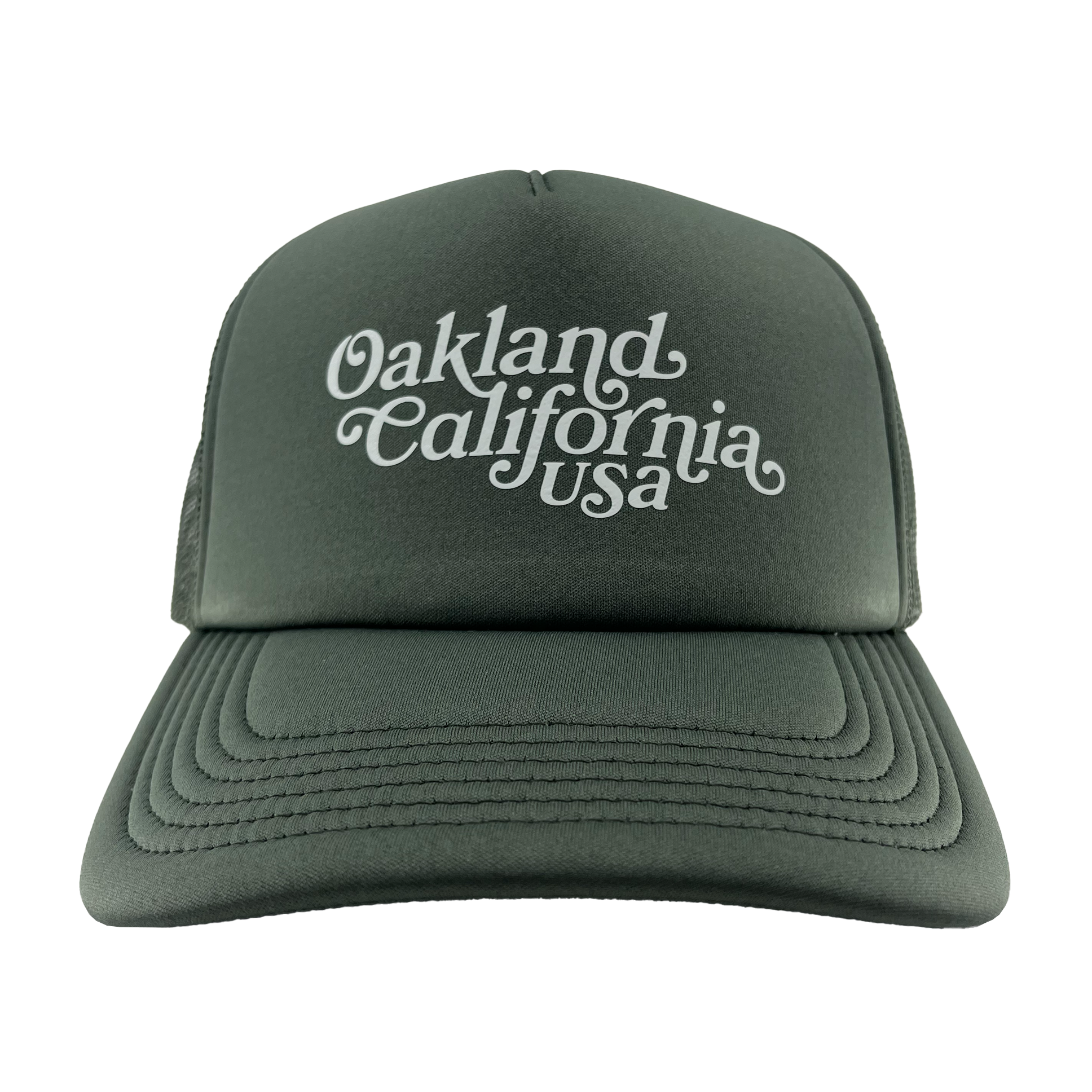 Front view of cypress green trucker cap with foam front panel and white Oakland, California, USA wordmark.