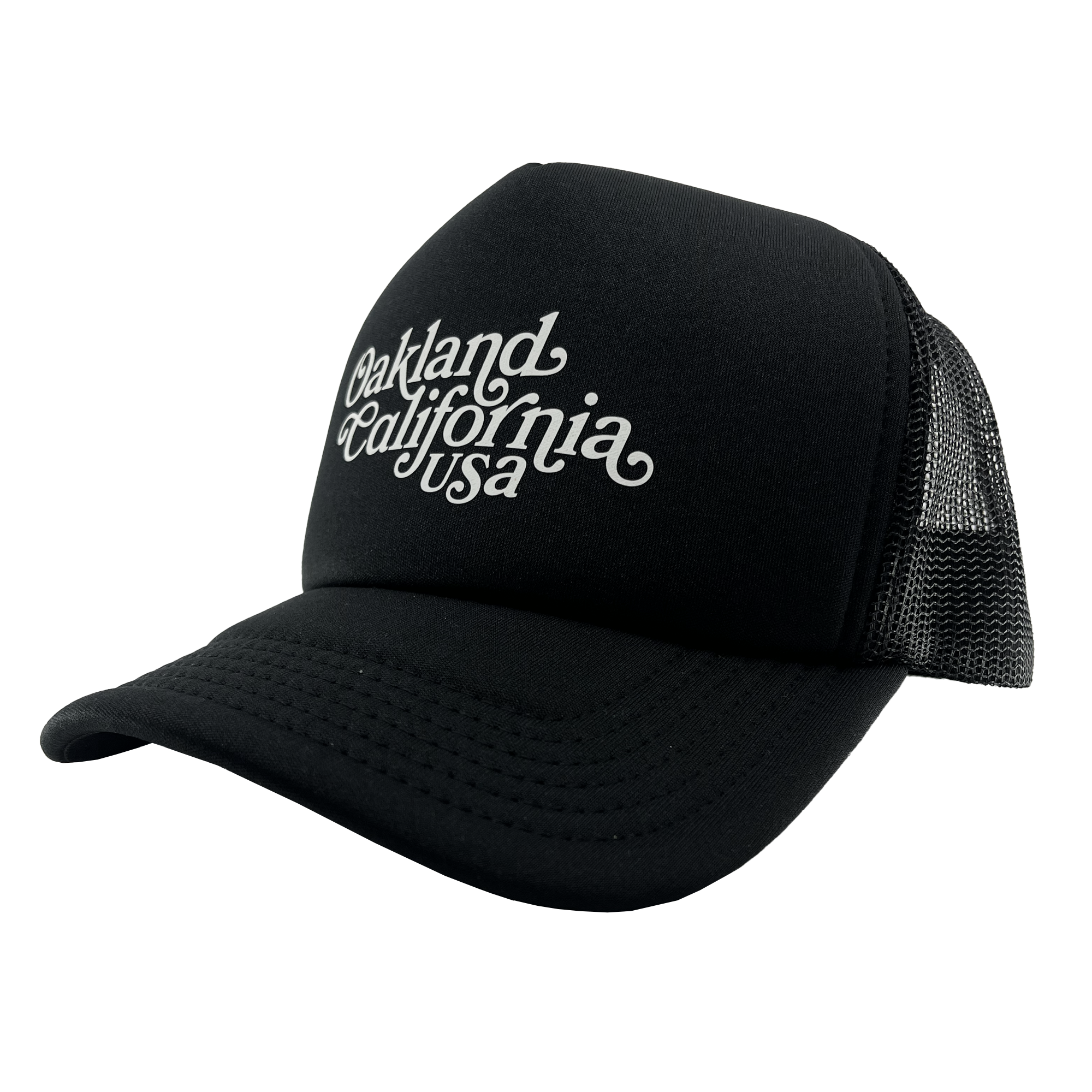 Side view of a black trucker cap with foam front panel, mesh back, adjustable back, and white Oakland, California, USA wordmark on the crown.