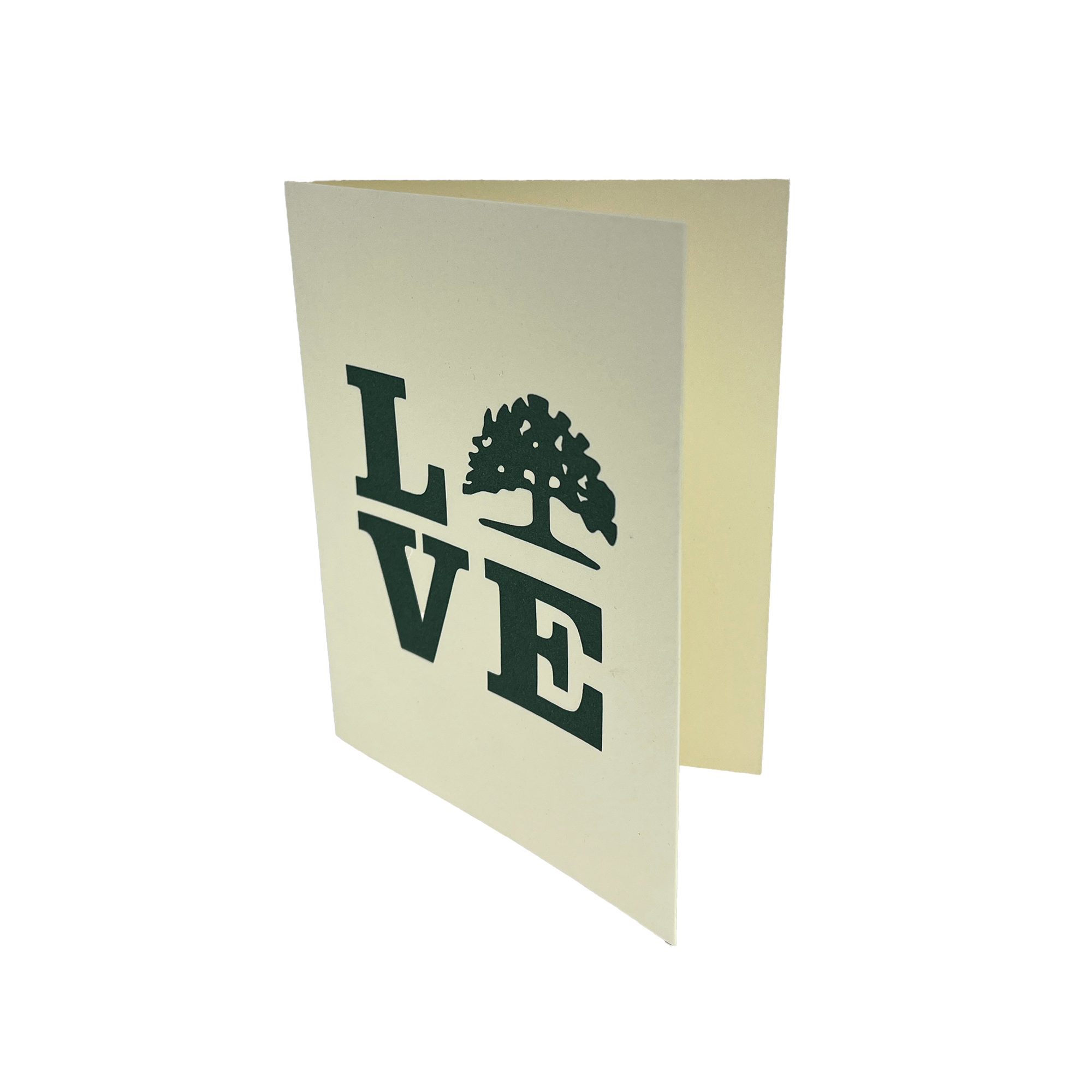 The Love Tree Card by Never Elsewhere is a vertically standing letterpress greeting card featuring the word "LOVE" on the front, with a tree silhouette replacing the "O." Made of cream-colored paper, this Oakland-inspired card is slightly open, revealing a blank inside.