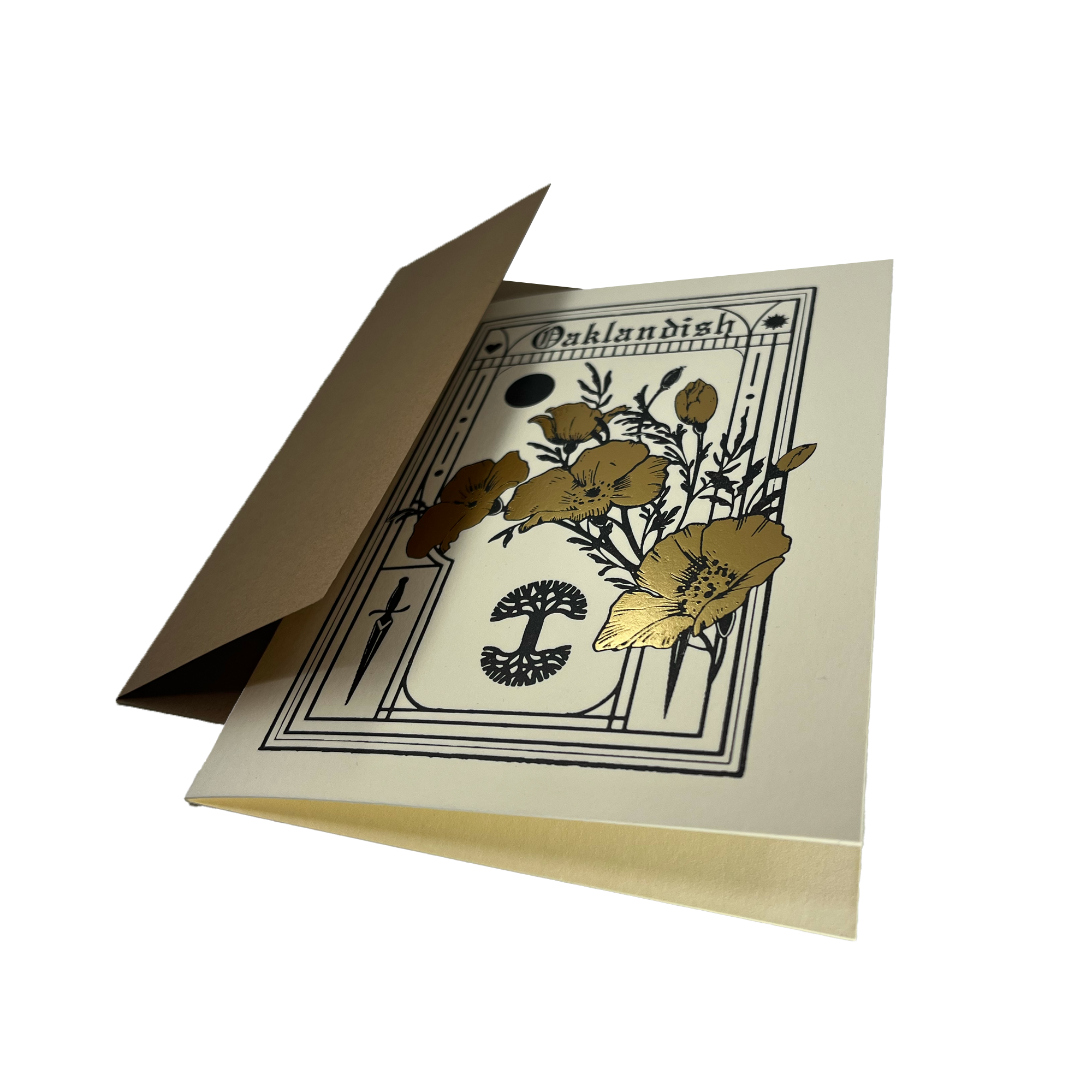 A sleek Blossom Card stands partially open, revealing a cover adorned with intricate floral designs in metallic gold foil and black ink. The word "Never Elsewhere" is visible at the top, accompanied by a decorative border and garden imagery on a cream-colored background. It comes with a recycled brown kraft paper envelope.