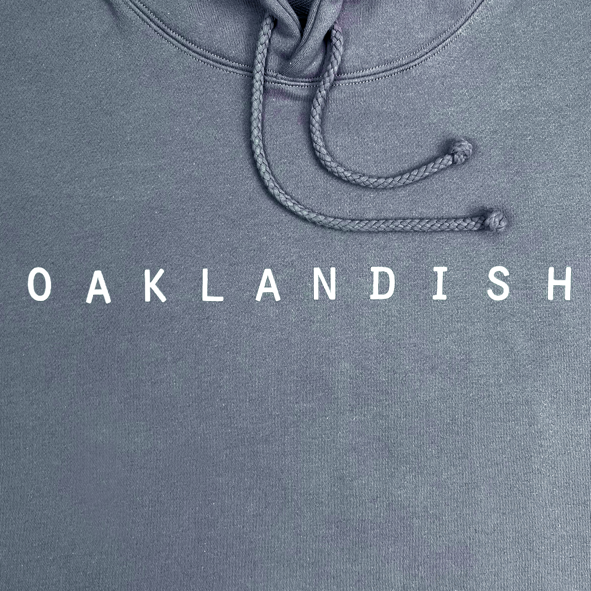 Detail front view of Premium pullover Hoodie - Classic Oaklandish, Storm blue.