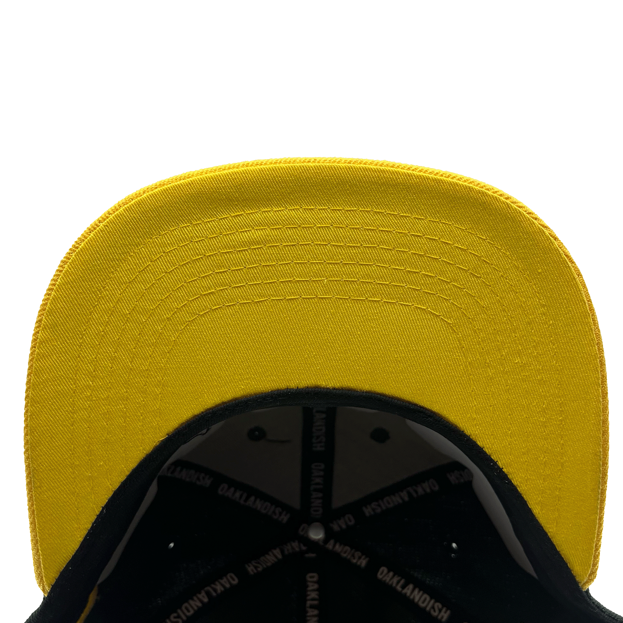 Underside view of flat yellow bill  with OAKLANDISH wordmark taping inside.