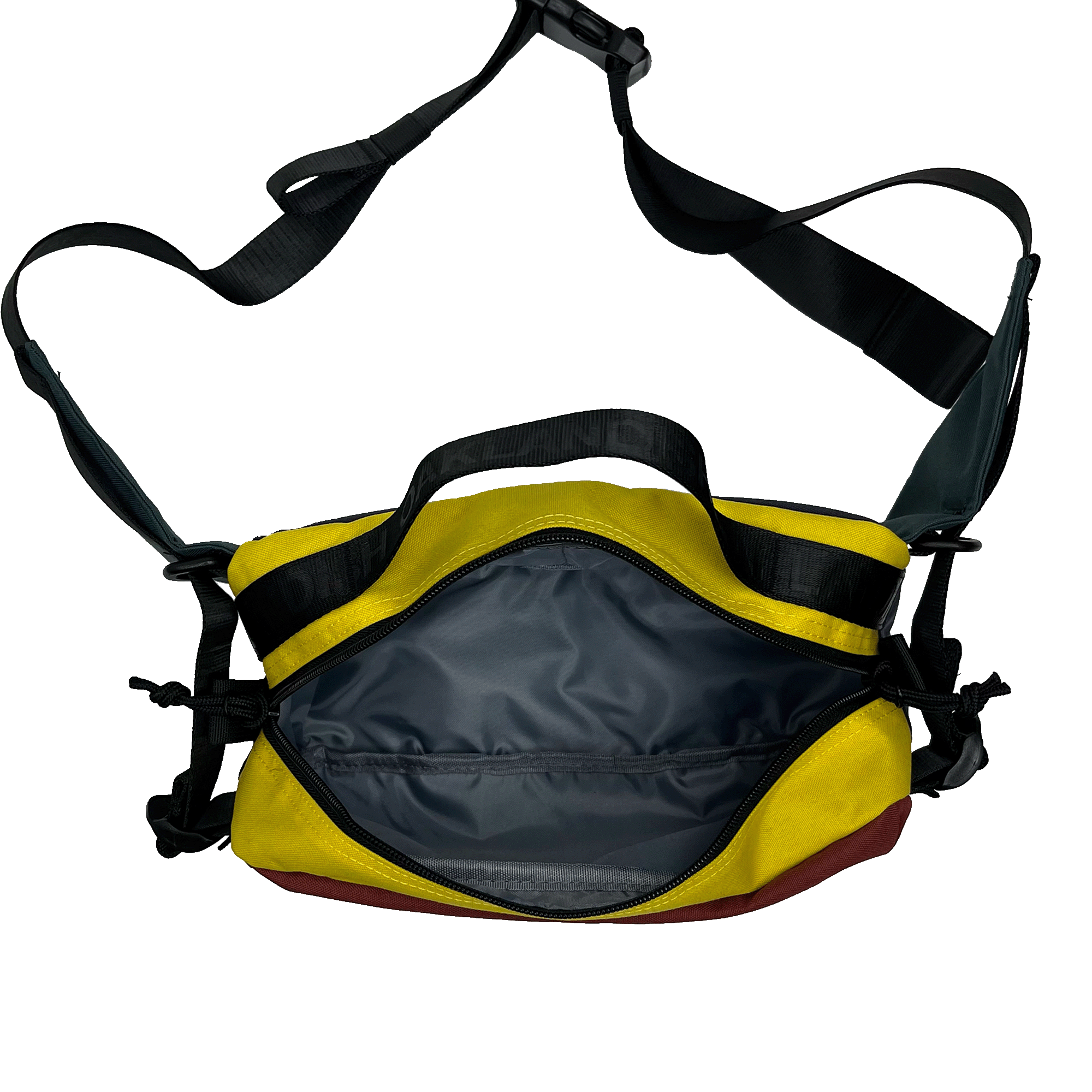 The Oaklandish Hip Bag by Oaklandish is a yellow and black shoulder bag featuring an open main compartment that reveals a spacious, grey-lined interior. This versatile bag comes with adjustable black straps and additional side clasps for support, while the bottom is maroon. Its unisex appeal and premium details make it stand out against a plain white background.