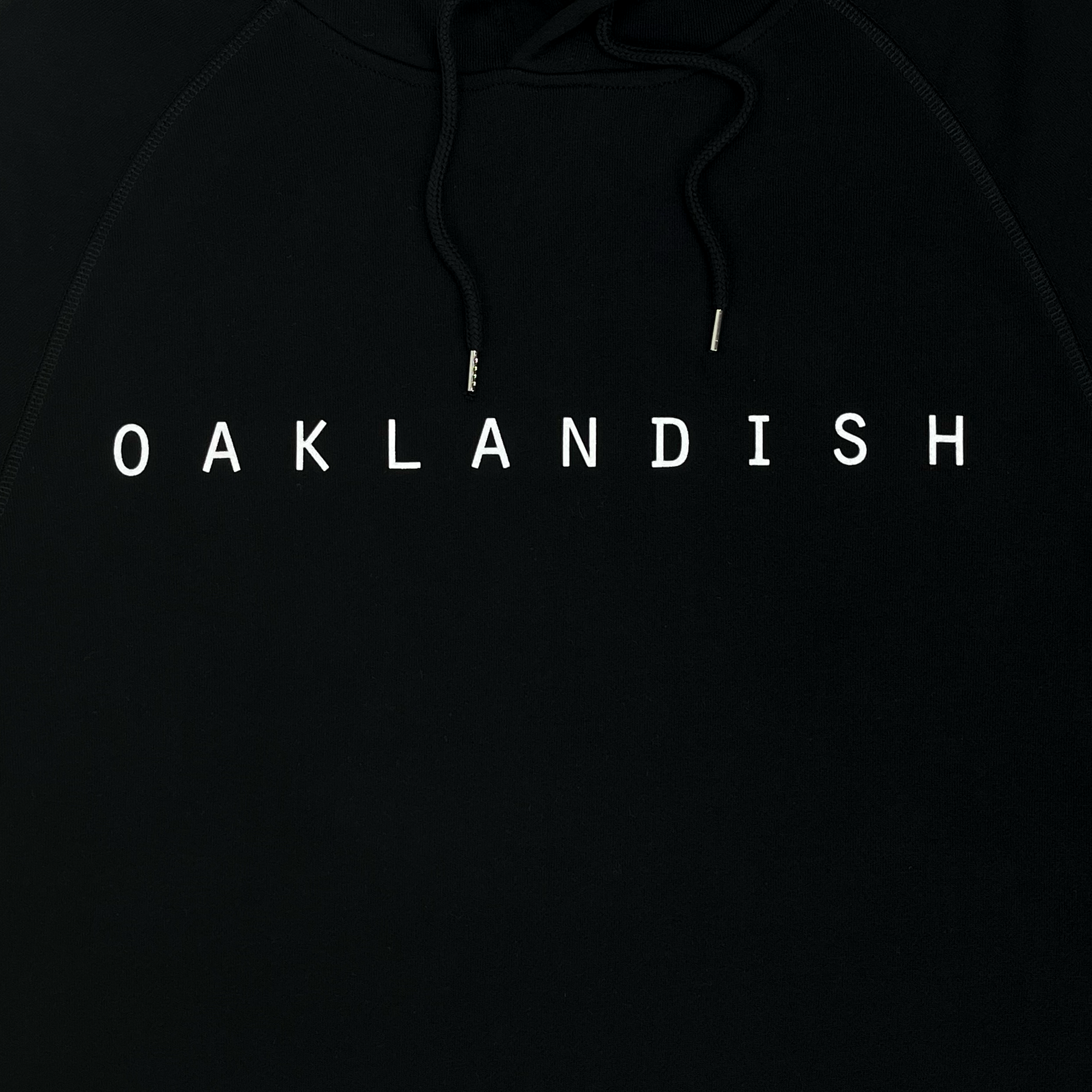 Detailed front view of premium pullover Hoodie - Classic Oaklandish, Black