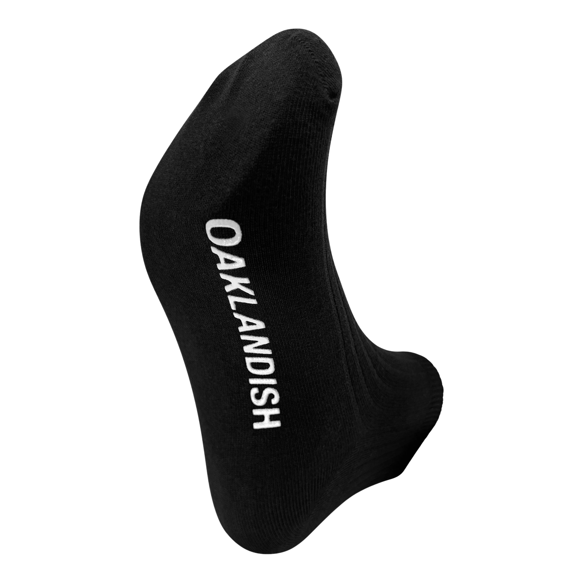 A single Grip Low Crew Sock by Oaklandish is displayed with the foot area facing forward. The sock features the word "OAKLANDISH" written in white capital letters along its sole. The plain white background perfectly highlights the Oaklandish sock.