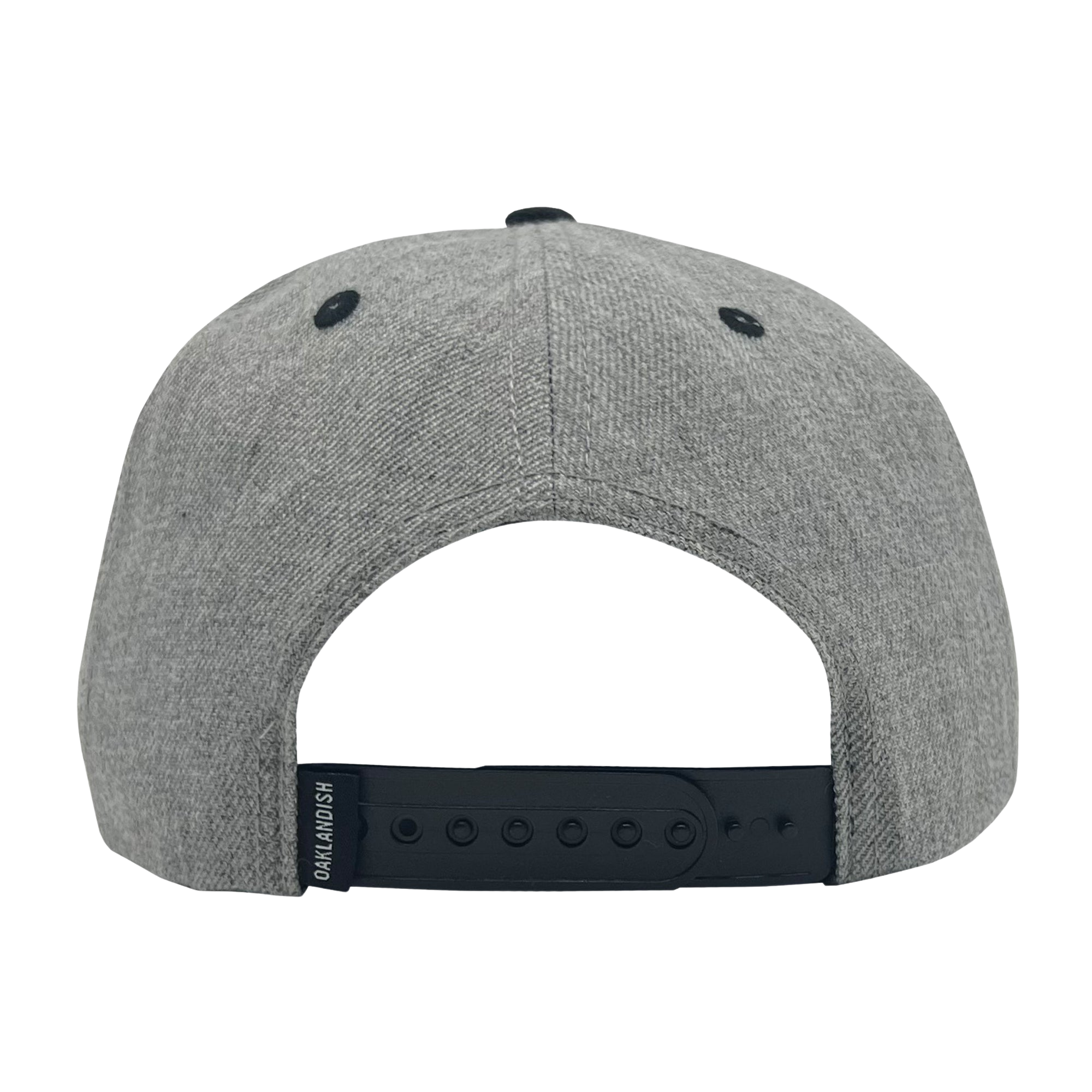 A gray Oaklandish Classic Snapback baseball cap is shown from the back. This headwear features a black adjustable snapback strap and two black ventilation eyelets on either side. A small black tag with white text is attached to the left side of the snapback strap.