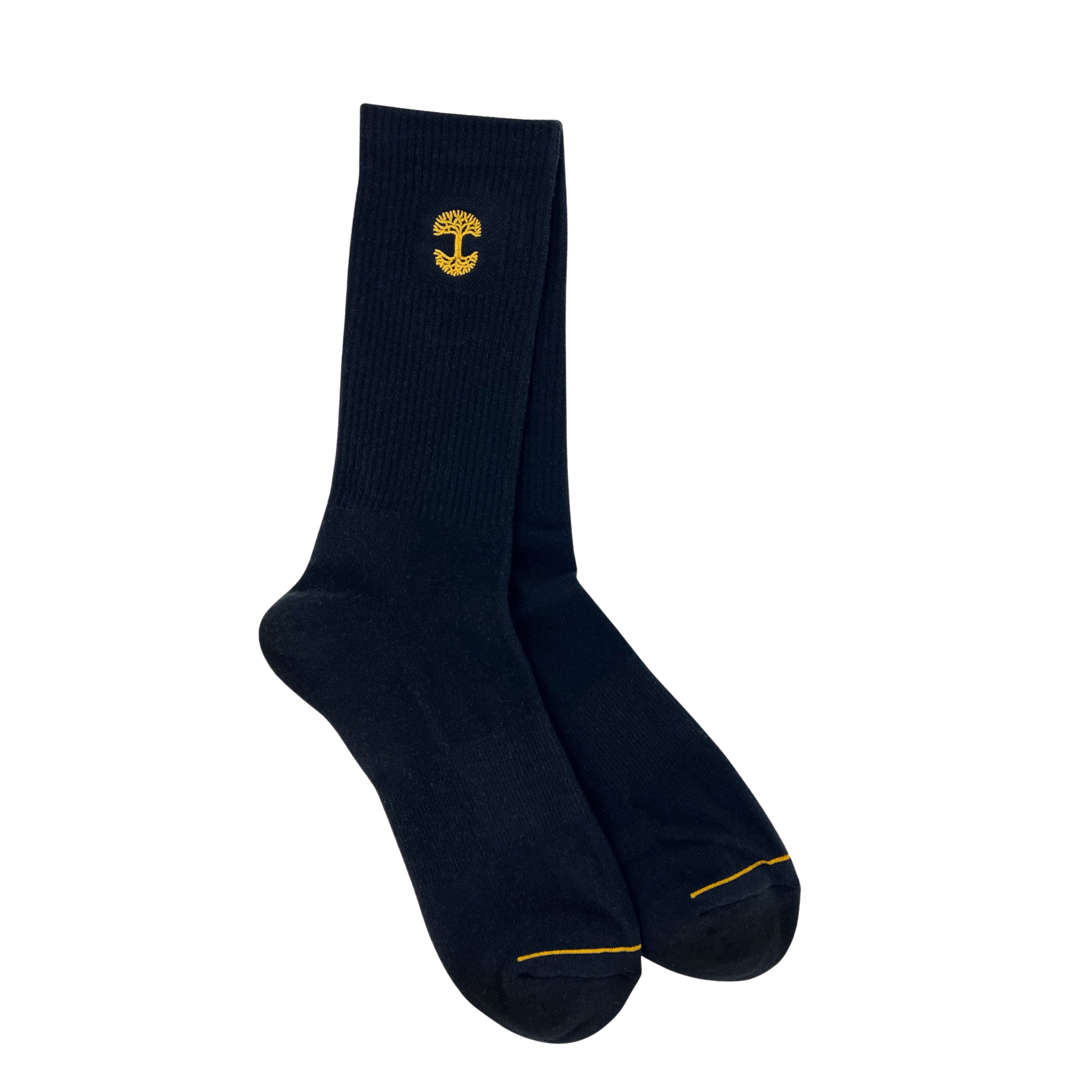 The Embroidered Logo Sock by Oaklandish is a pair of black/gold crew socks, featuring a small yellow mushroom logo embroidered near the top. These adult-sized socks have a ribbed texture on the upper portion and smooth fabric on the foot area, as well as reinforced toes stitched with yellow thread for added durability.