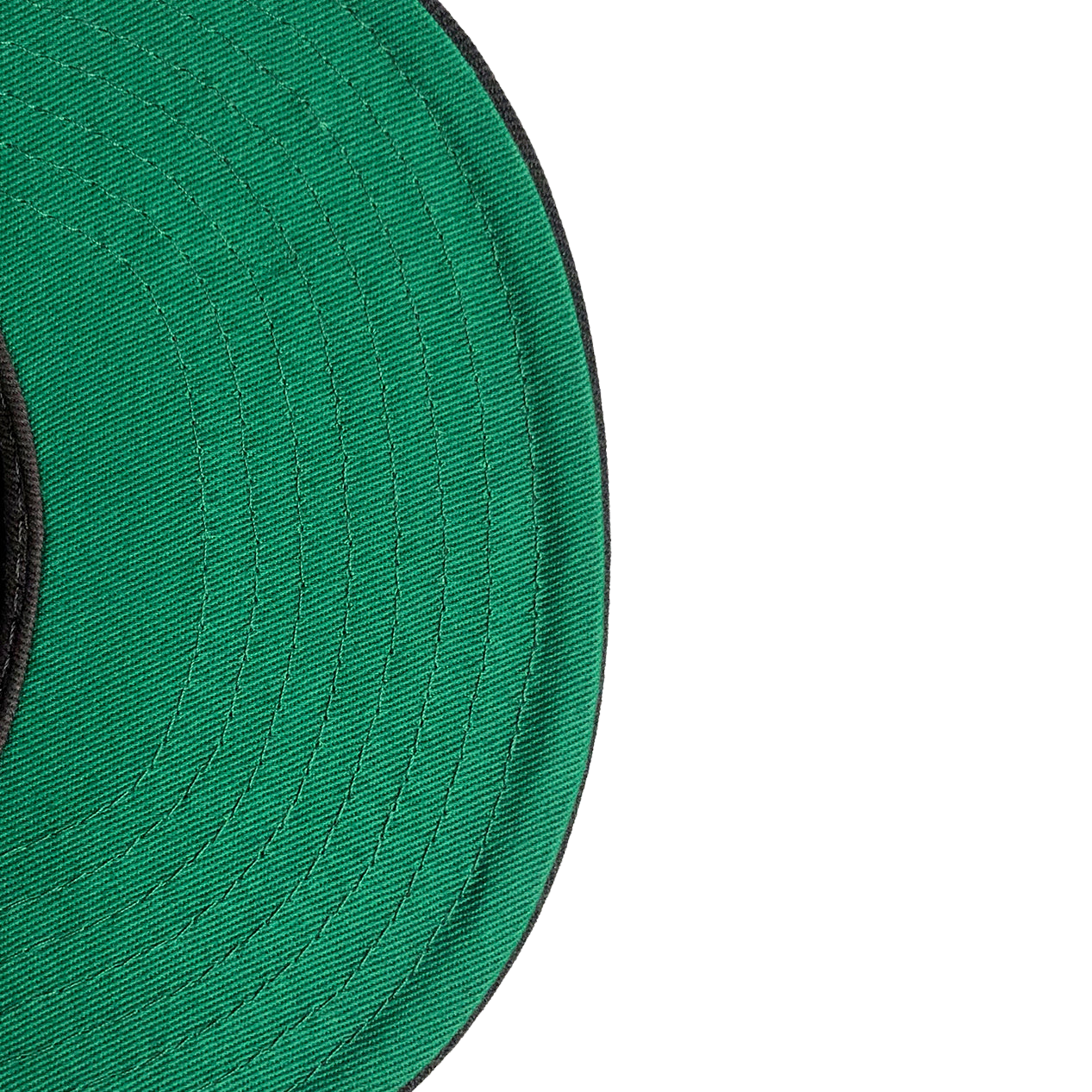 Close-up of the underside of the green brim from a New Era Oakland Roots SC 59FIFTY Fitted cap, showcasing detailed concentric stitching. The edge of the black-trimmed brim is slightly angled toward the top left corner, with the remainder of it extending out of frame to the bottom left. The background is white.