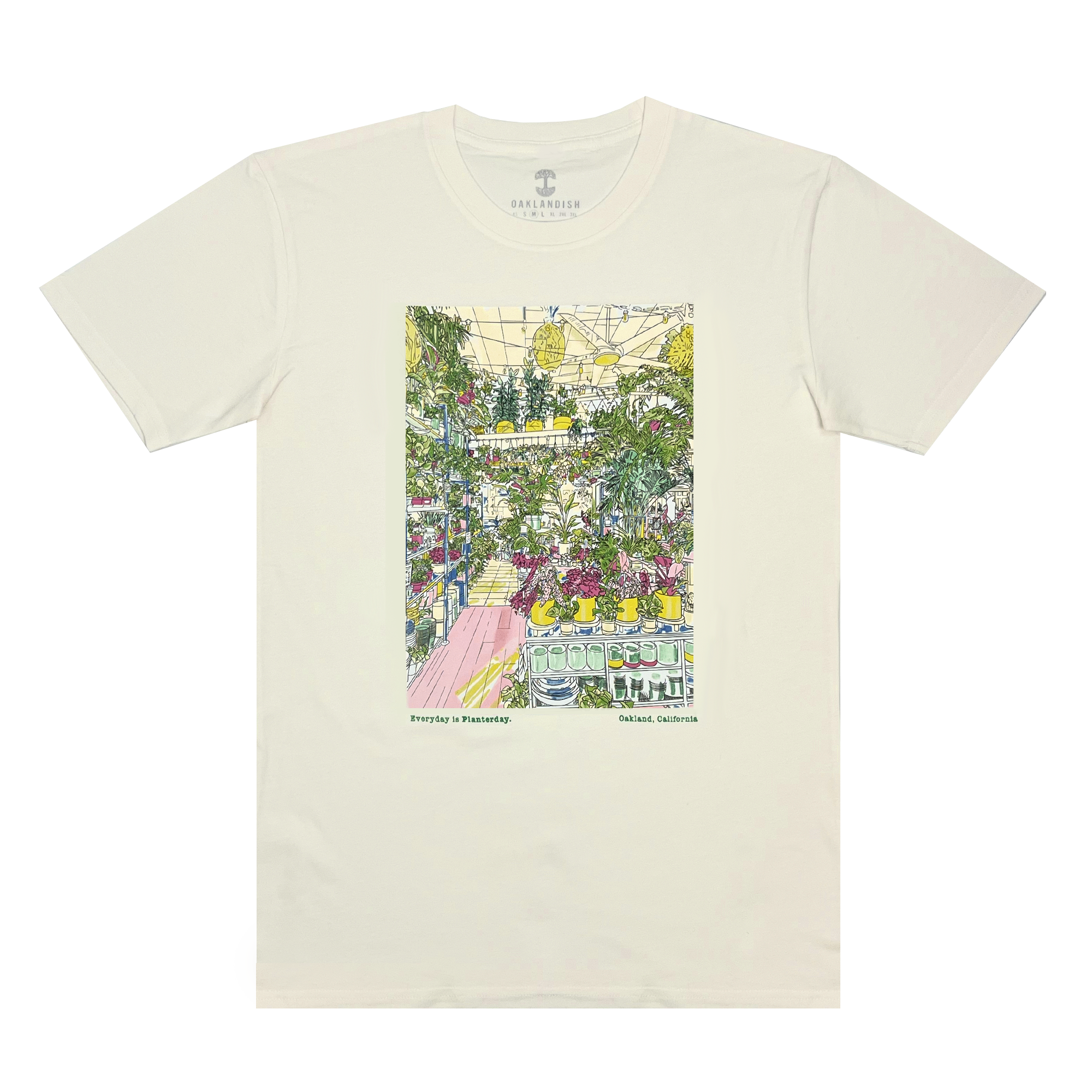The Planterday X Oaklandish Tee from the brand Oaklandish is a light-colored T-shirt that showcases an illustration of an indoor plant shop. The design features numerous potted plants and flowers arranged on shelves and tables, set against a background of lush greenery. Beneath the illustration, the text reads "Keeping it Plantastic—Planterday" and "Oakland, California." The label indicates "Oak & Lumber.