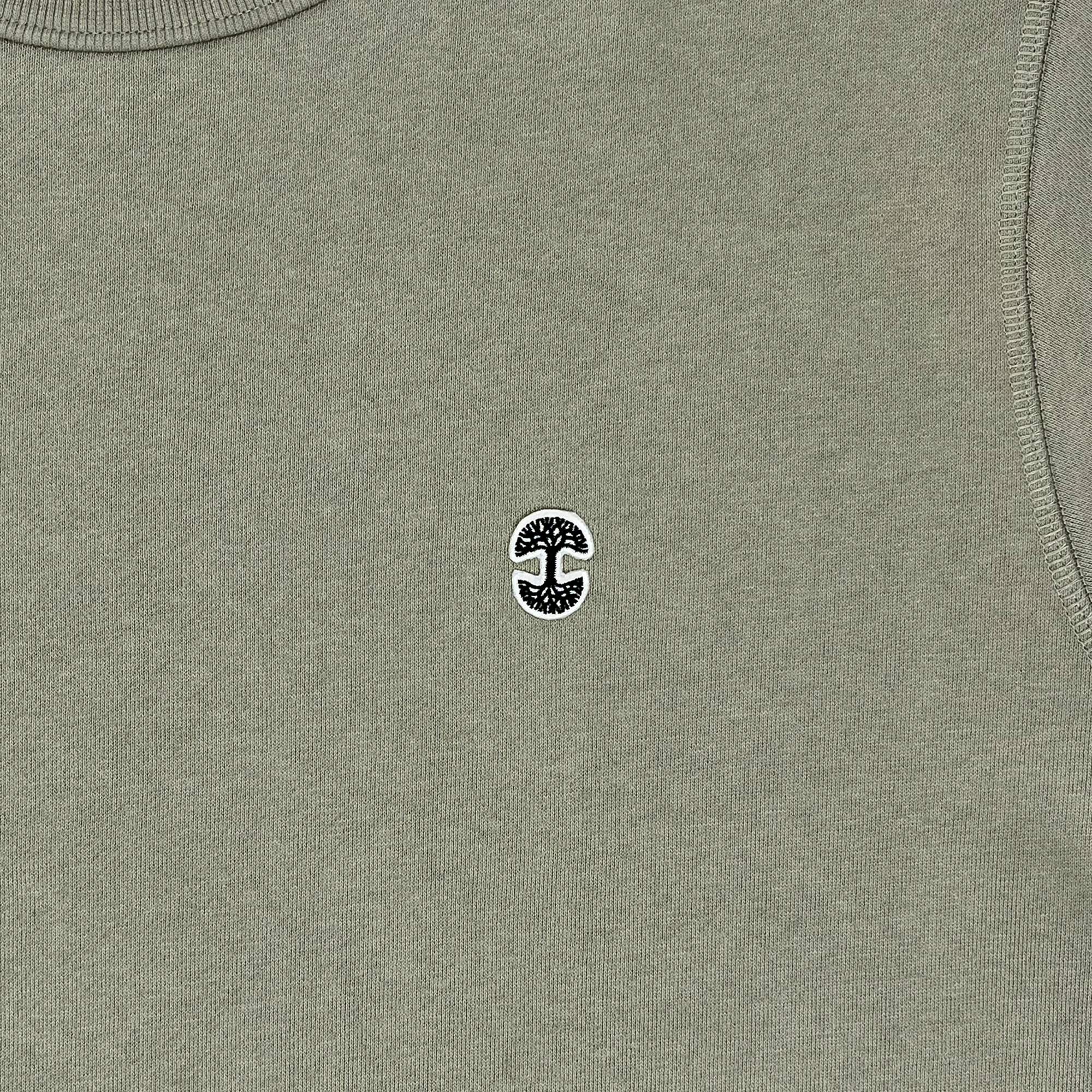 Detailed front view of Premium crewneck sweatshirt - Oaklandish tree logo, Eucalyptus