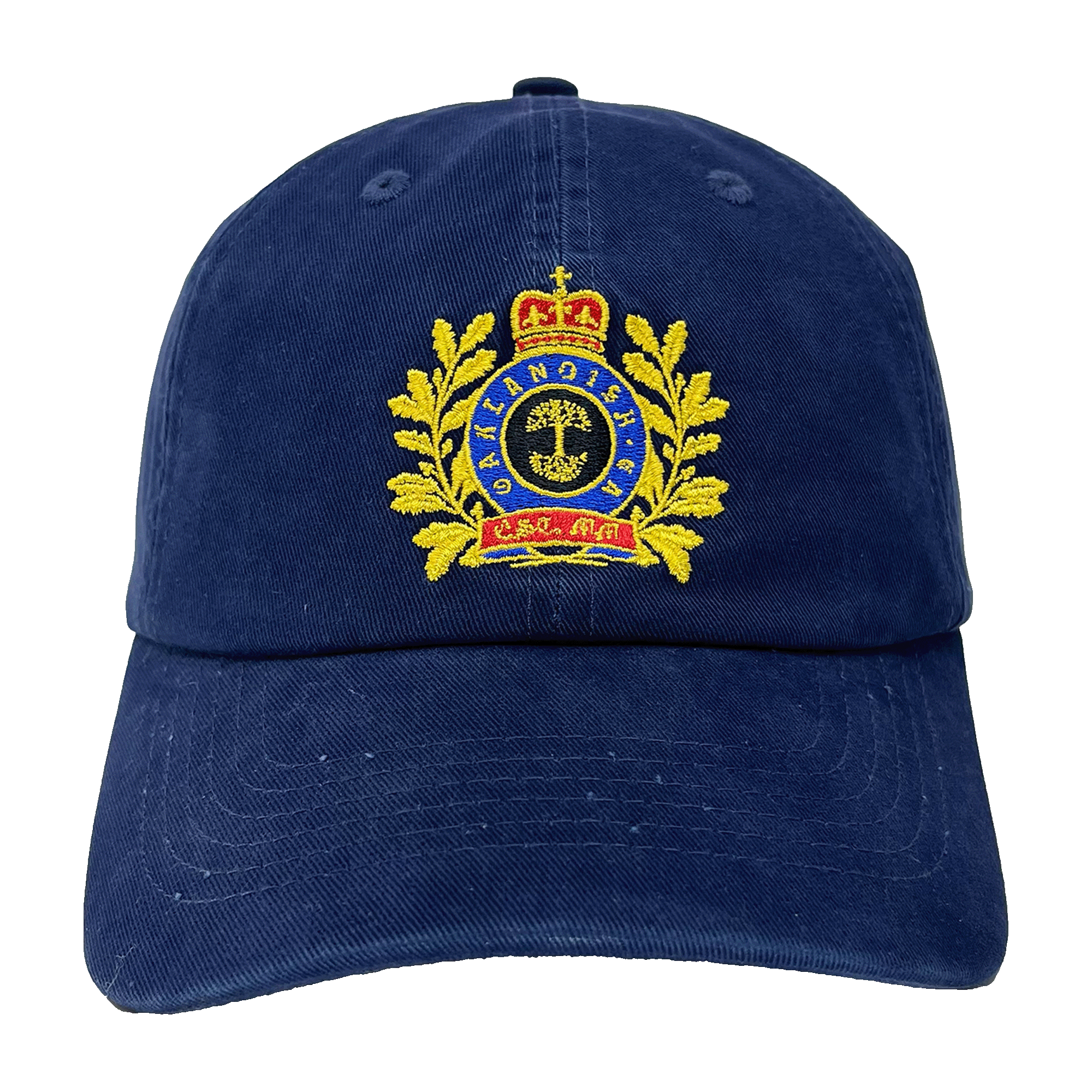 Front view of a navy blue dad cap with a prominent royalty-inspired embroidered Oaklandish patch on the crown.