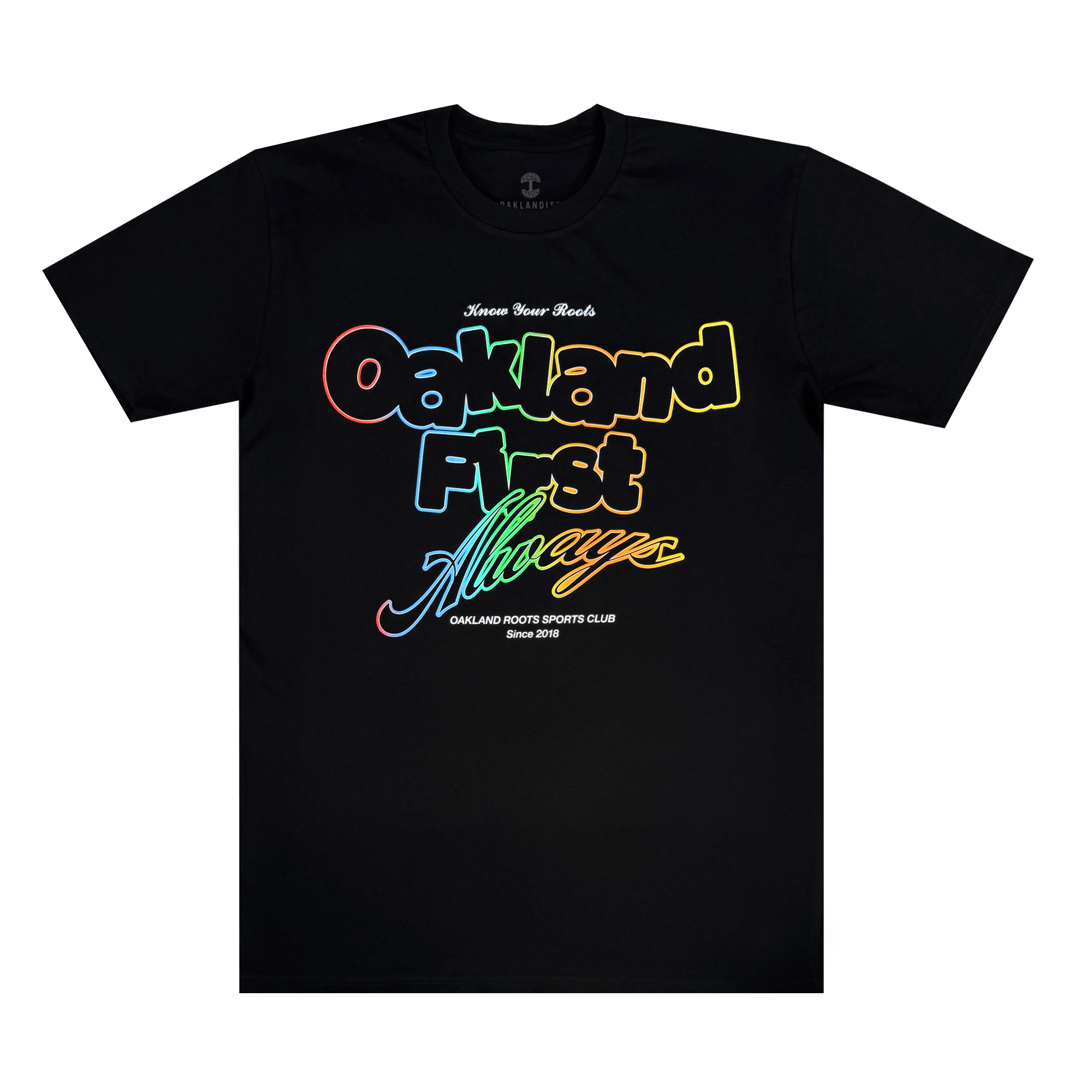 The OFA Different Tee by Oakland Roots SC is a black T-shirt featuring "Oakland First Always" in bold rainbow gradient, topped with "Know Your Roots." It also highlights the Oakland Roots Sports Club and marks "Since 2018," celebrating unity and social good.