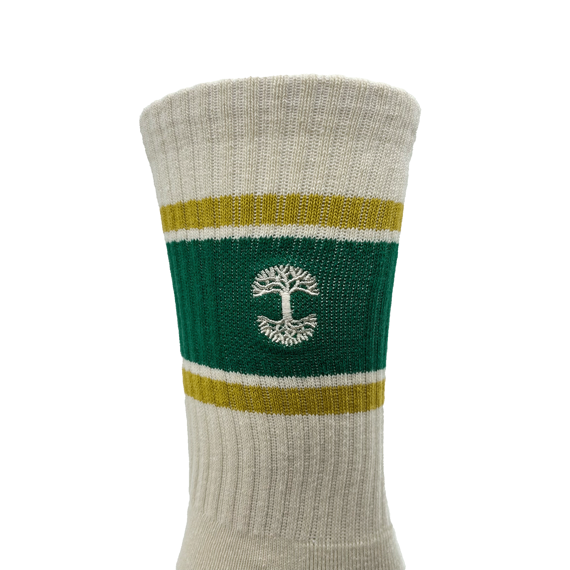 A close-up view of the Striped Classic Sock by Oaklandish, offered in adult sizes. This beige crew sock features a green band with yellow borders around the calf area, showcasing a white tree emblem knitted in the center. Made from 70% cotton, it has a ribbed texture and appears to be mid-calf length.