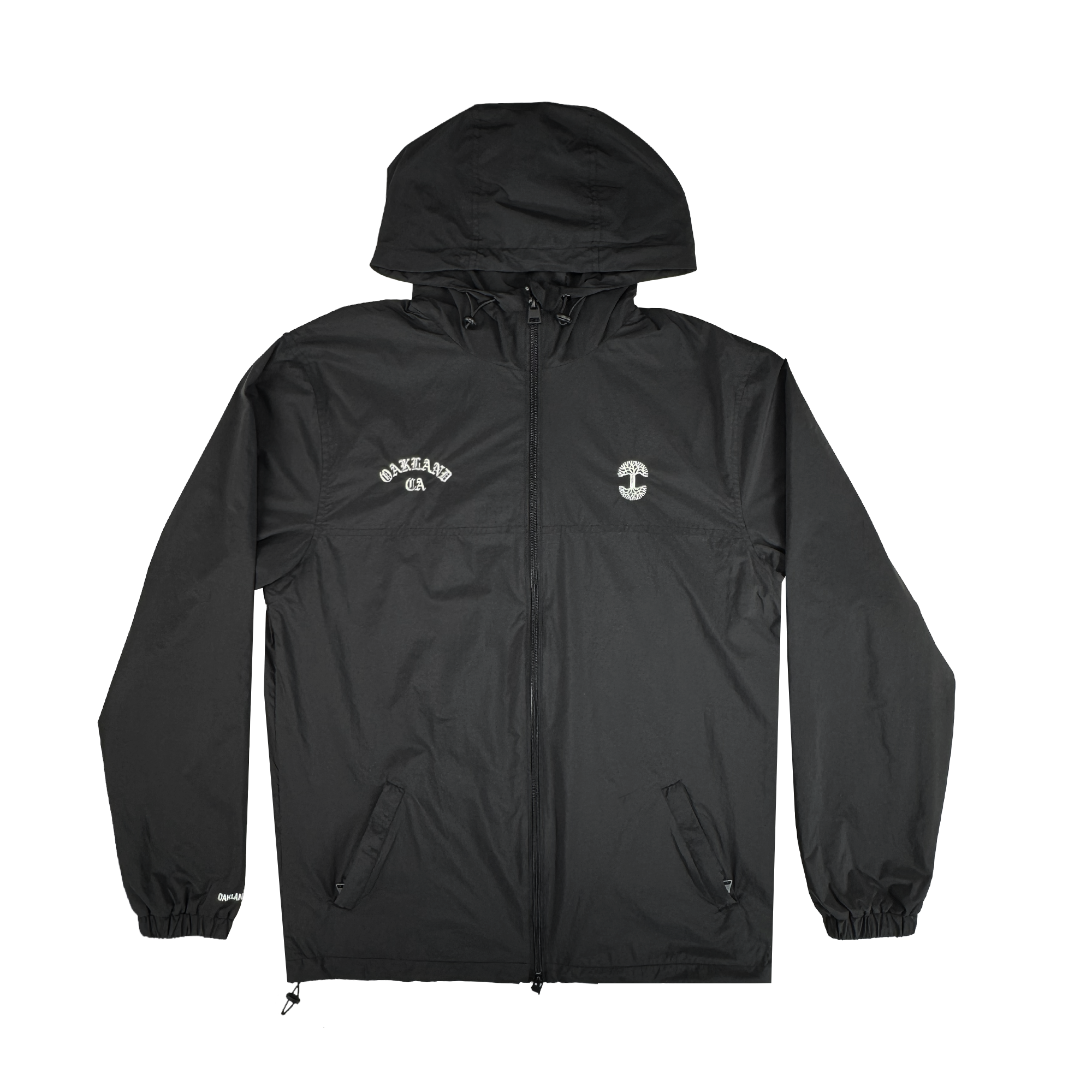 The Oaklandish Susurrus Track Top is a sleek black nylon hooded jacket with a front zipper, elastic cuffs, and two front pockets. "OAKLAND CA" is printed in white on the left chest; a small white circular logo accents the right chest.