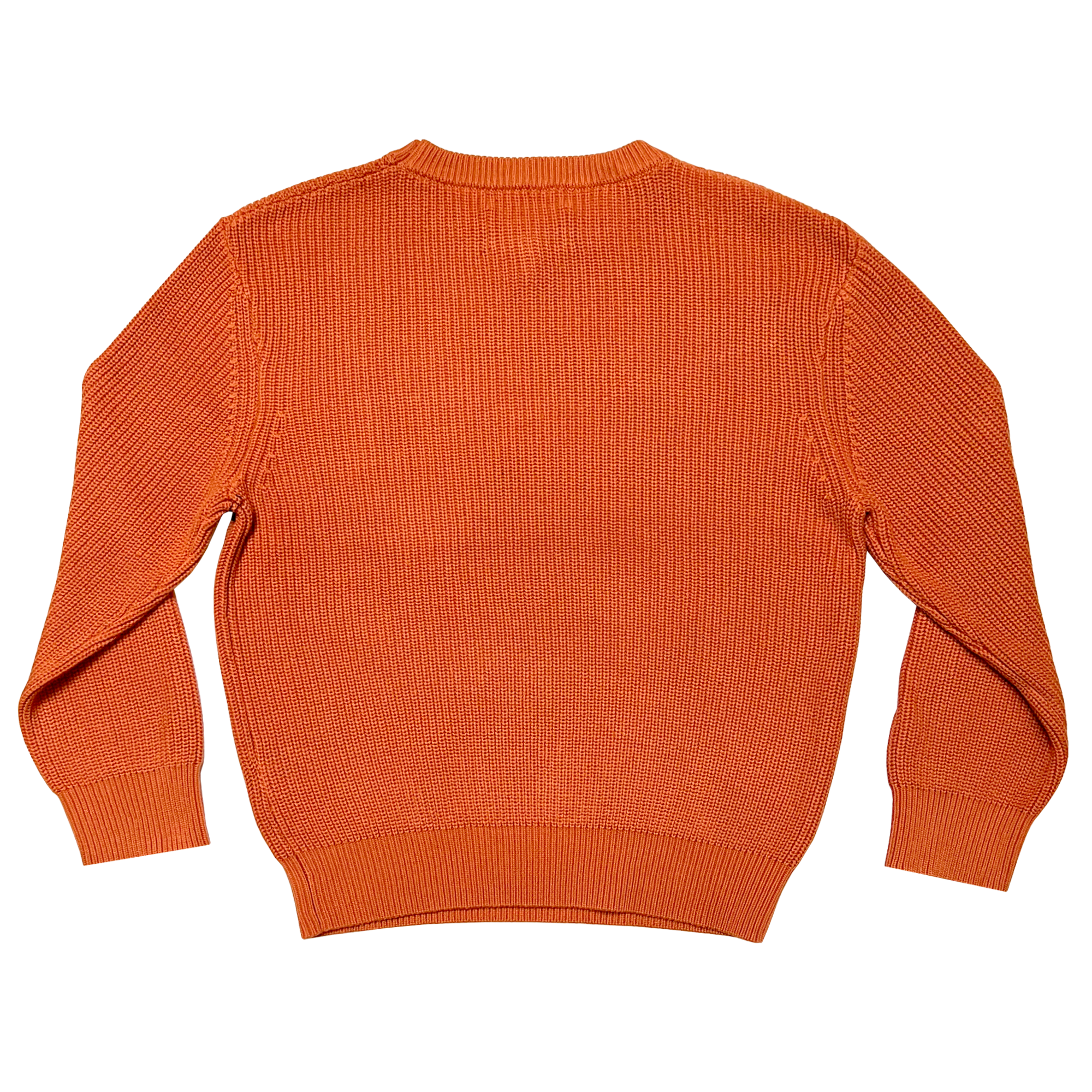 The backside of a heavy cotton knit sweater in autumn orange.