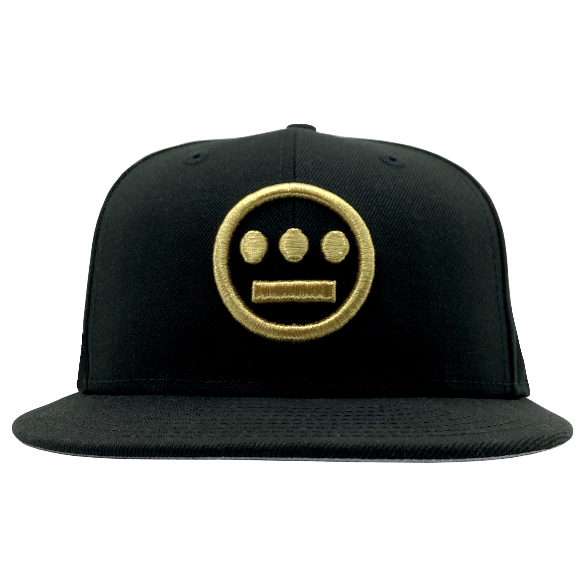The New Era Hiero 59FIFTY Fitted Cap from Hieroglyphics features a black fabric with a flat brim, adorned with a gold embroidered circular logo reminiscent of hieroglyphics. The logo includes a straight line near the bottom and three smaller circles evenly spaced above it. This cap also has a white tag protruding on the right side.