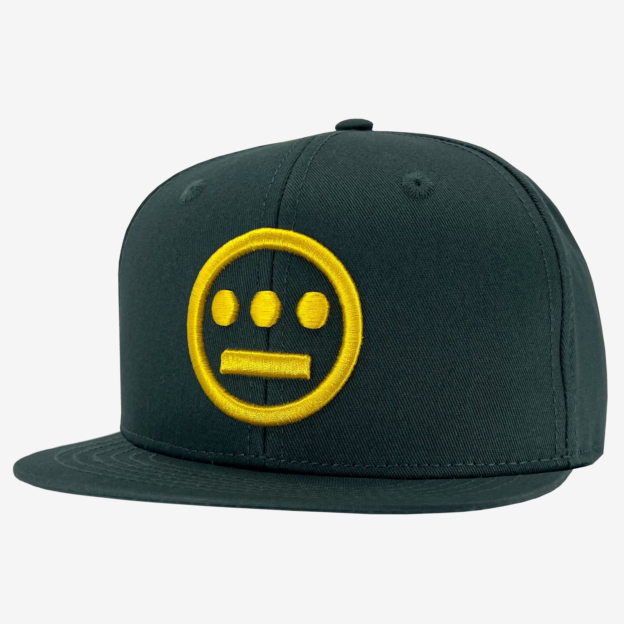 The Hiero Logo Snapback by Hieroglyphics is a dark green hat with a flat brim design. It features a yellow circular emblem on the front, containing three evenly spaced dots above a horizontal line that evokes ancient hieroglyphics. The hat has a structured, high-profile crown with eyelets for ventilation.