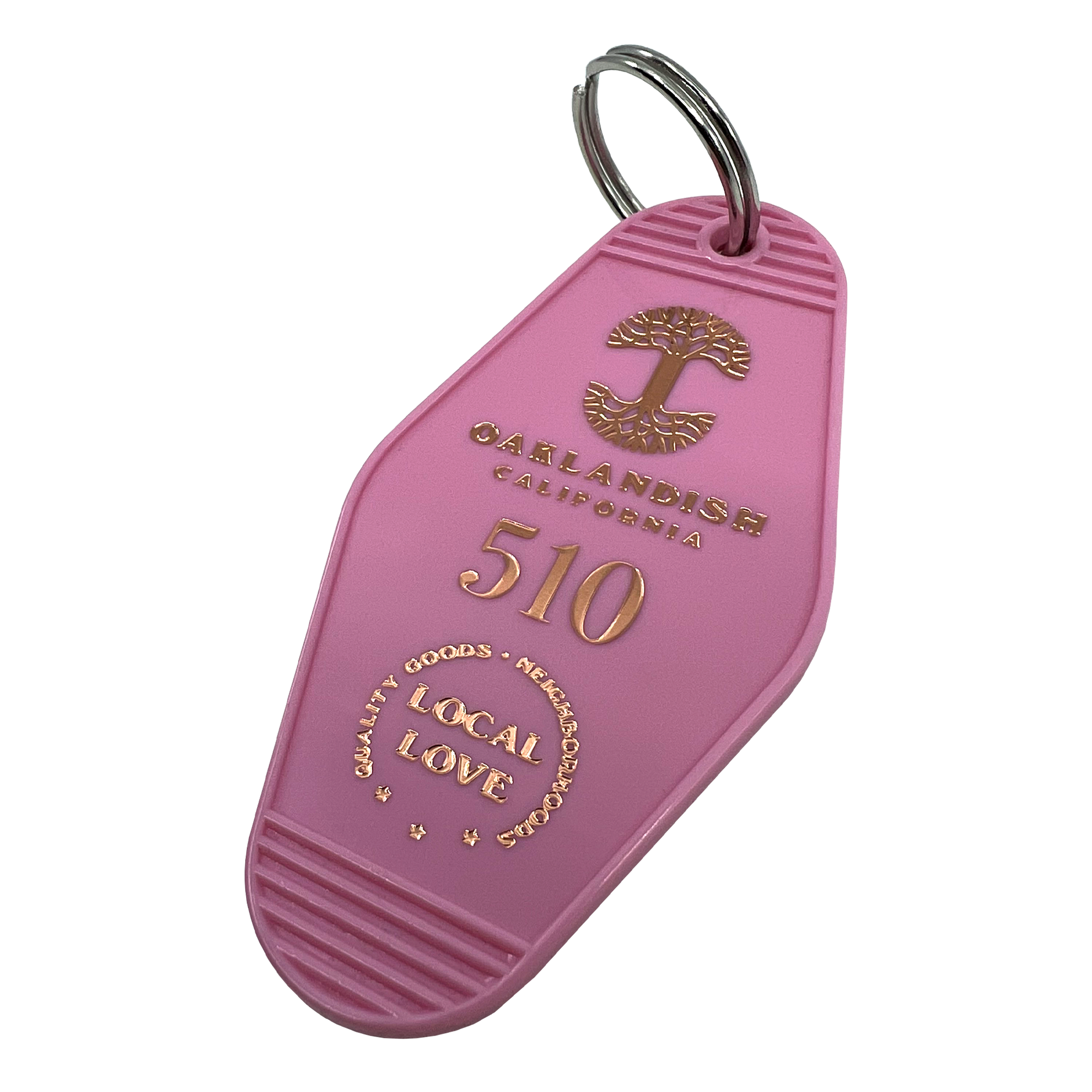 Detailed angle image of Pink vintage motel-style keychain with gold Oaklandish Logo and wordmark and 510 local love logo.