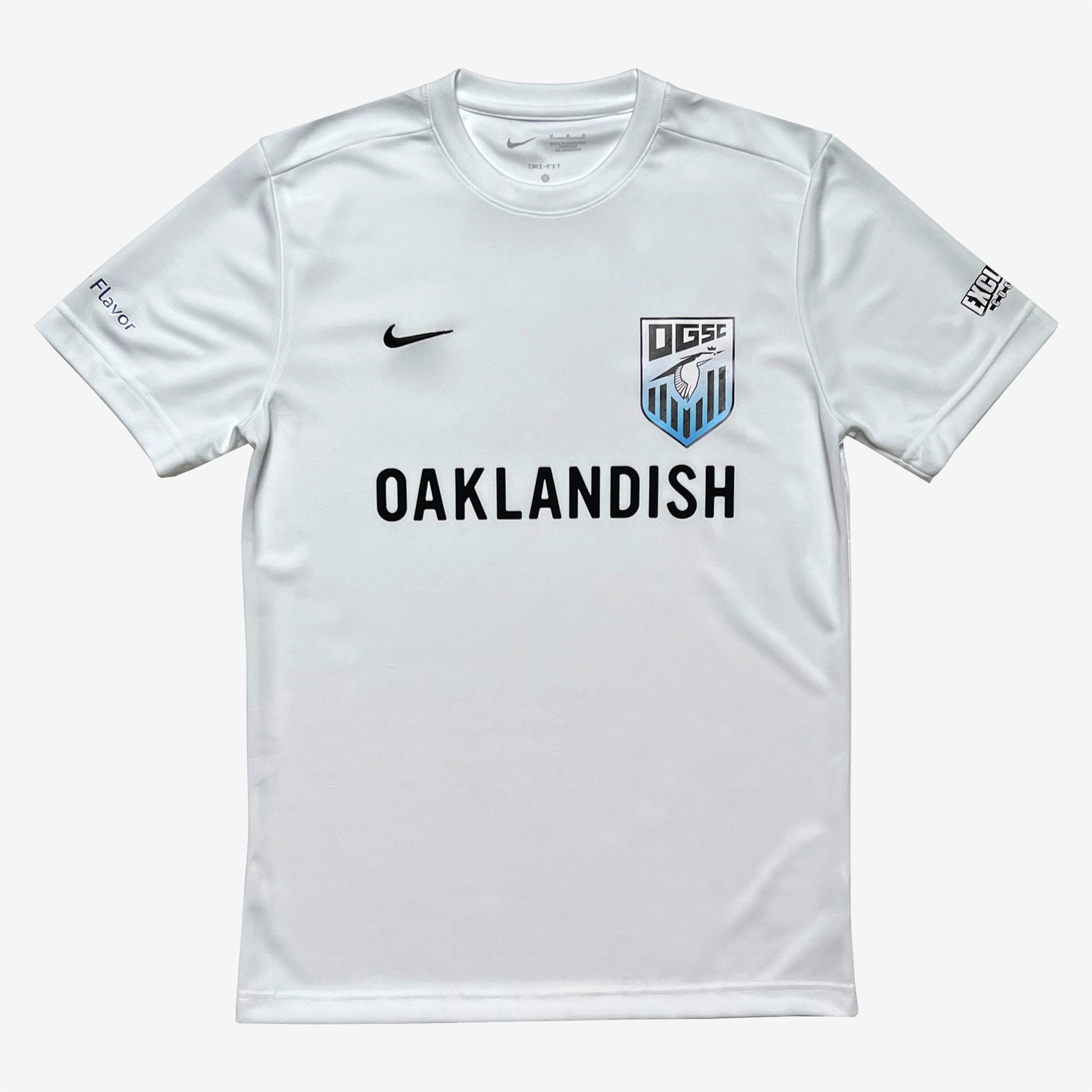White home game soccer jersey with Oaklandish wordmark, Oakland Genesis heron logo and Nike logo. 