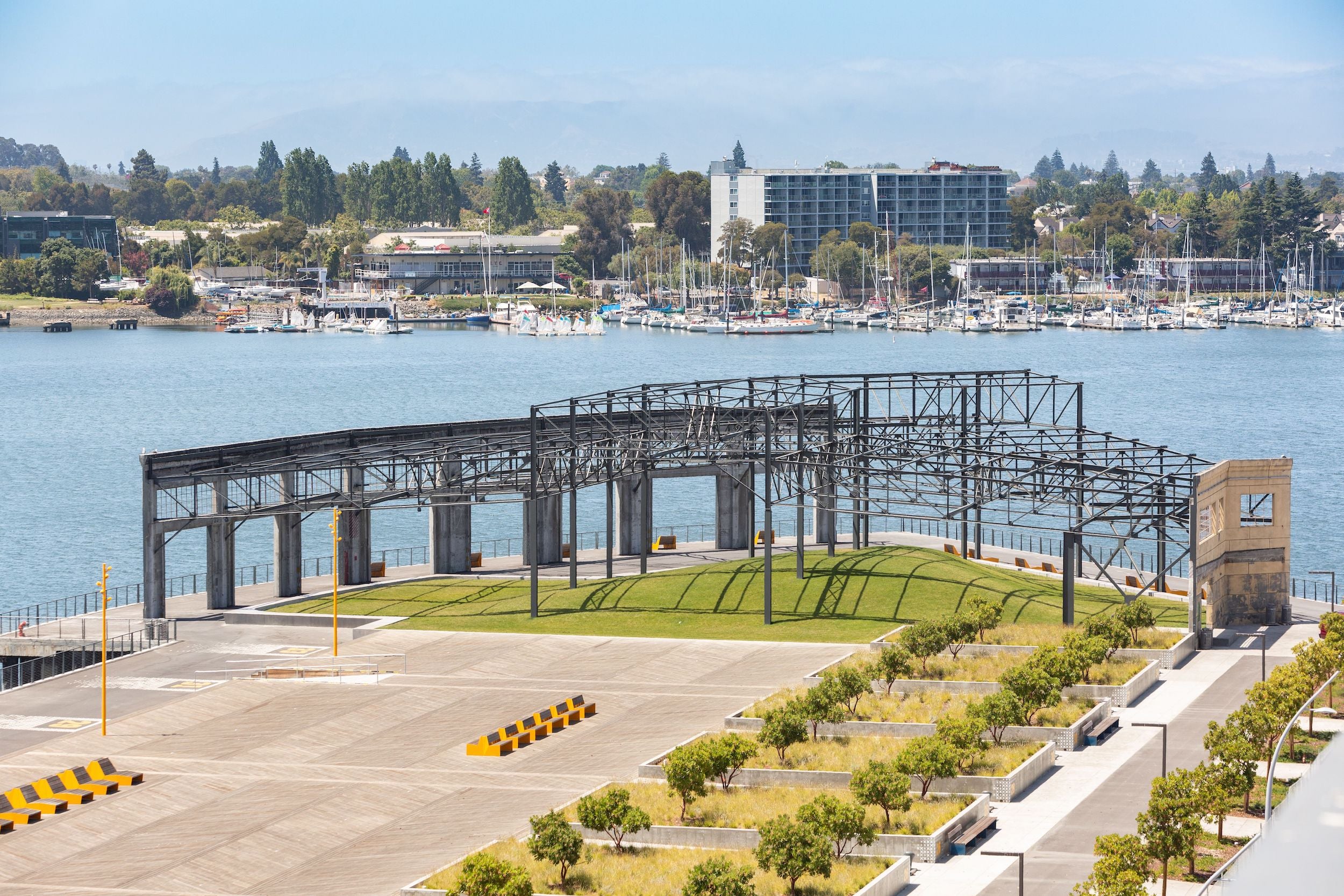 Drone image of Township Commons park, along the Oakland estuary. Metal structure is iconic.