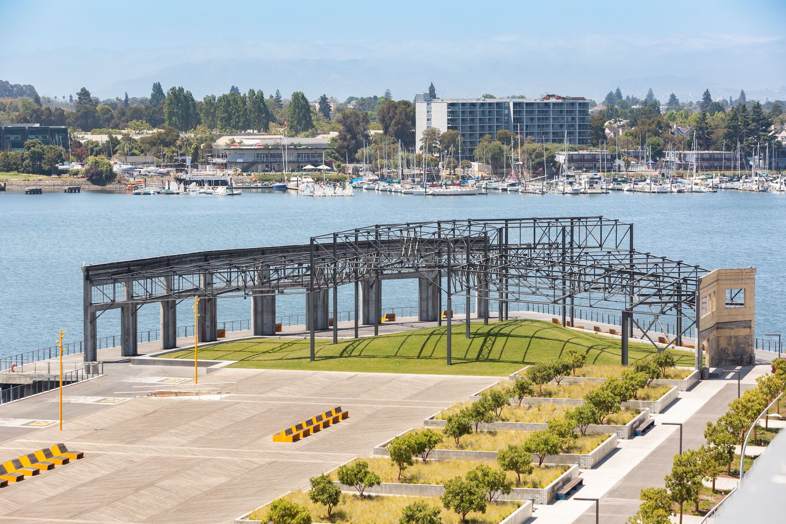 Drone image of Township Commons park, along the Oakland estuary. Metal structure is iconic.