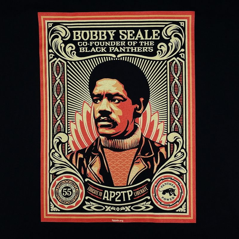Close-up of a large illustrated graphic by Shepard Fairey, founder of Black Panthers on a black long-sleeve t-shirt.