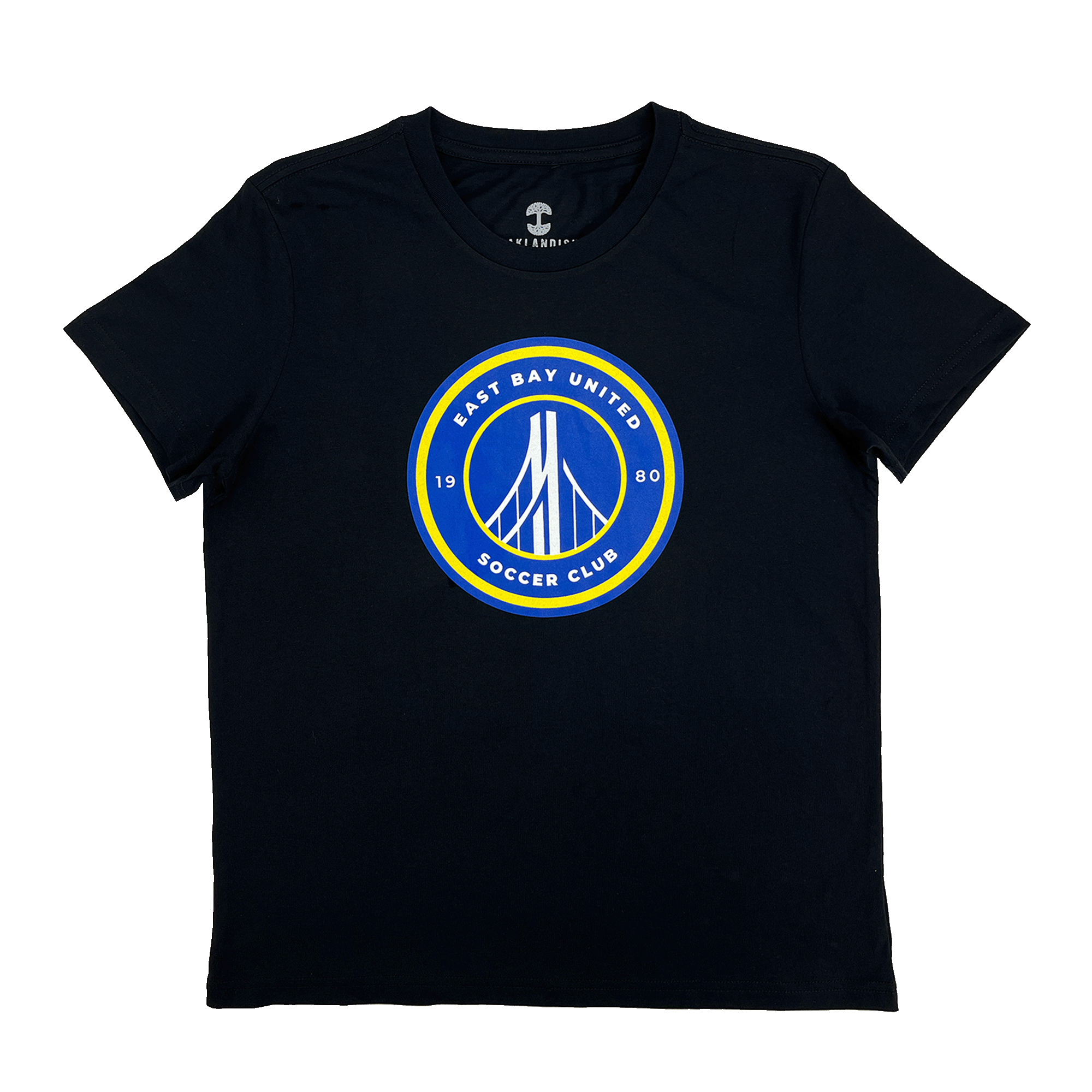 The EBU Women's Tee by Supported Brands is a black t-shirt featuring a circular emblem on the chest. The emblem, with yellow and blue borders, showcases a stylized white bridge illustration in the center. The text around the emblem reads "EAST BAY UNITED SOCCER CLUB" at the top and "1980" at the bottom, celebrating our vibrant youth soccer club.