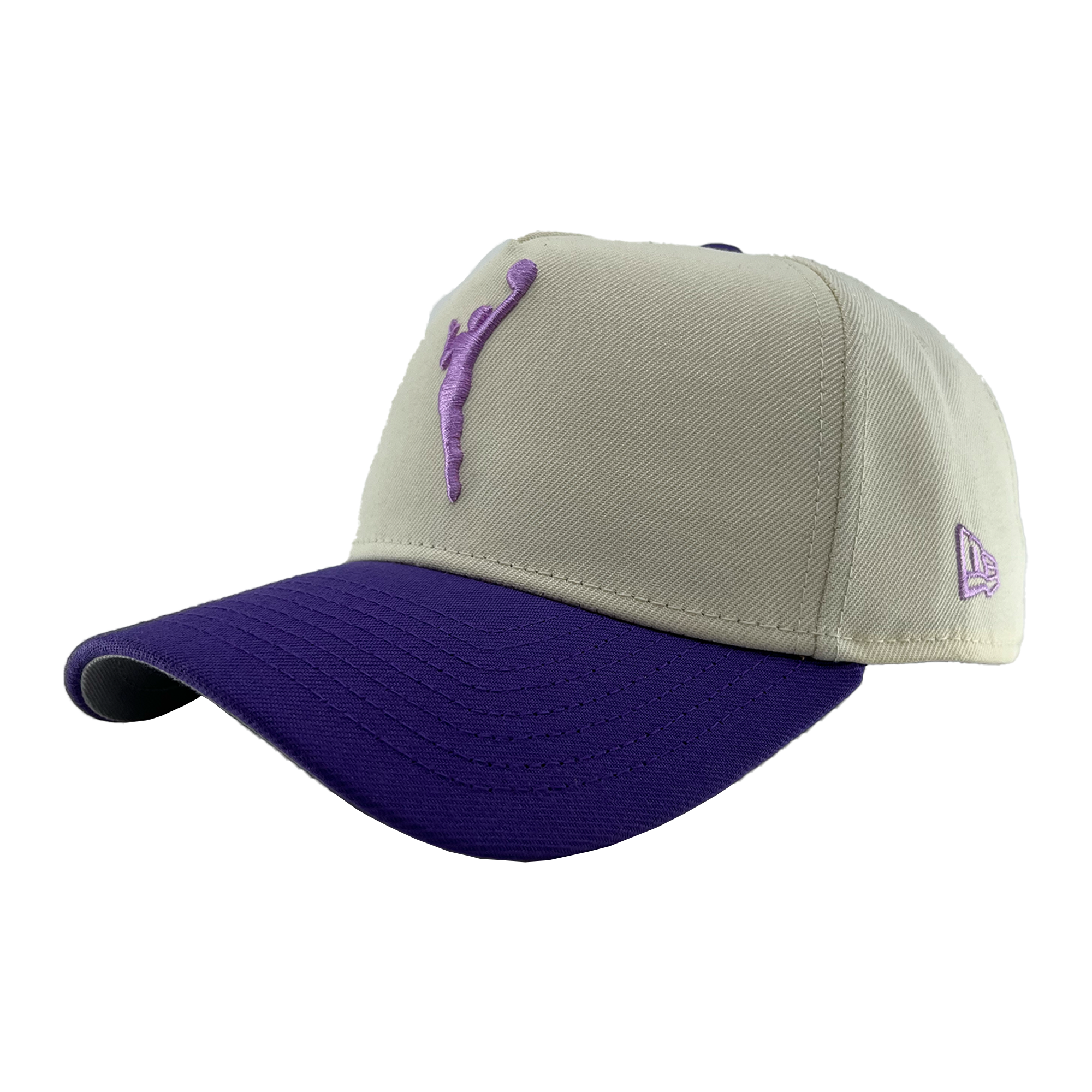 The GSV 9FORTY AF 2 Tone by GSV is a beige adjustable snapback with a purple brim, purple stitching, and an embroidered purple jumping silhouette on the front. A small purple New Era logo accents the left side. Background is plain white.