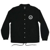 Black coaches jacket with snap closure, collar, and drawstring waist and Hiero logo printed in white on front left chest.