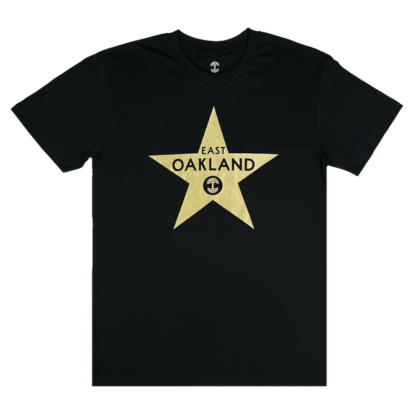 Black t-shirt with gold East Oakland walk of fame star from Casita restaurant.