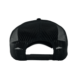 Back view of the mesh backing and adjustable closure on a black Oaklandish trucker cap.