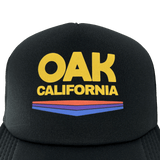 Close-up of Oak California graphic on front foam panel of a black Oaklandish trucker cap.