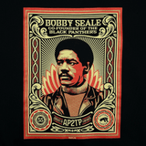 Close-up of the large illustrated graphic by Shepard Fairey, founder of Black Panthers, on a black limited edition hoodie. 