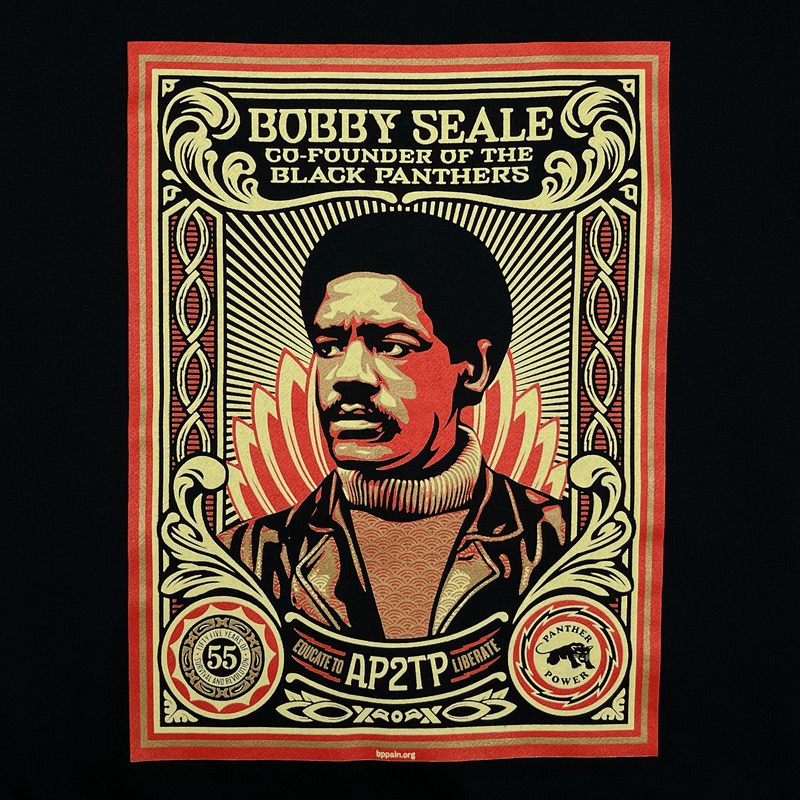 Close-up of the large illustrated graphic by Shepard Fairey, founder of Black Panthers, on a black limited edition hoodie. 