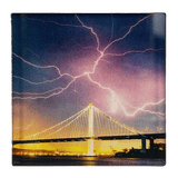 Image of lightning in night sky over Oakland bridge by photographer Vincent James. 