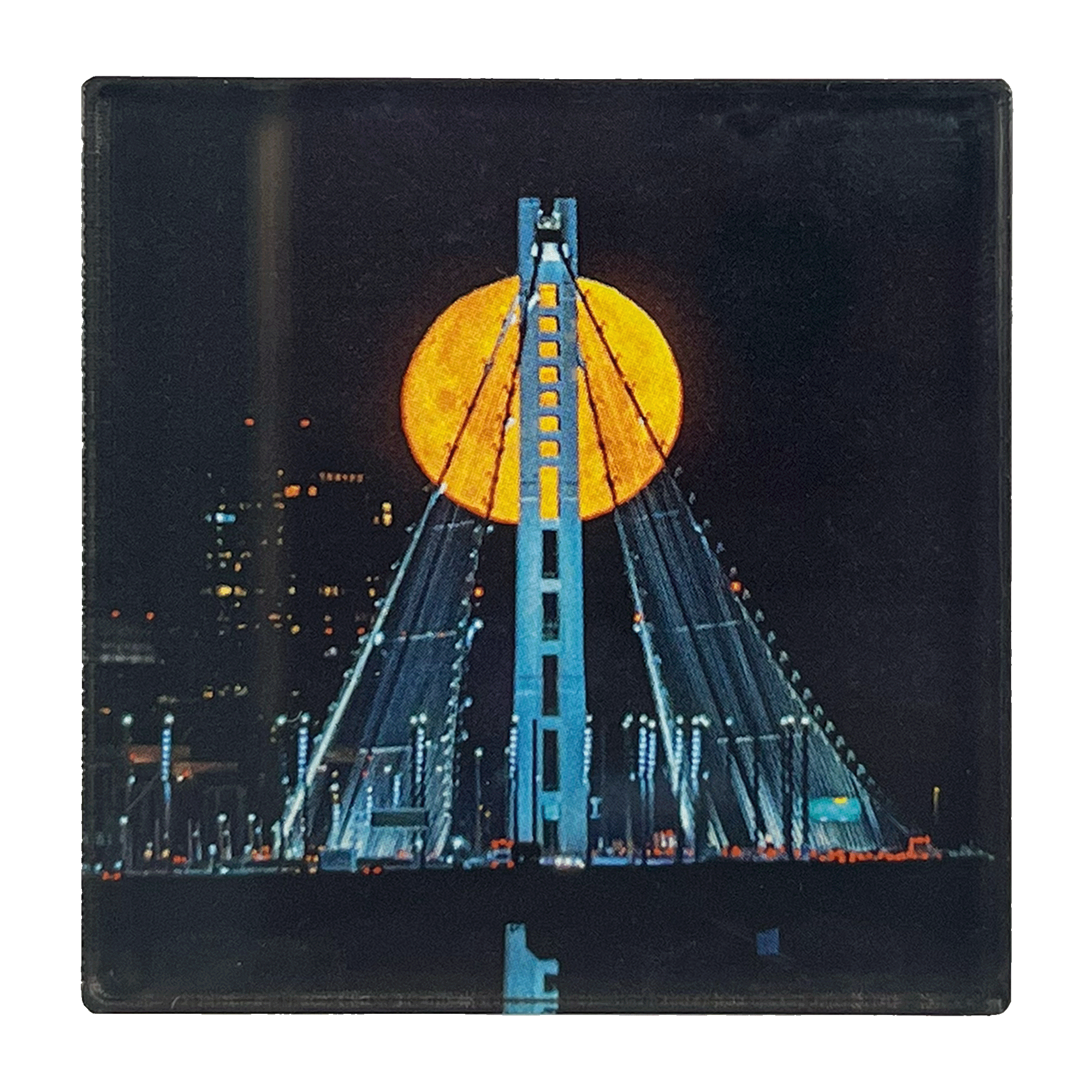 Image of full moon over Oakland's Bay Bridge by photographer Vincent James.