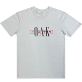Flat image of white t-shirt with OakTown printed at center in red and white ink.