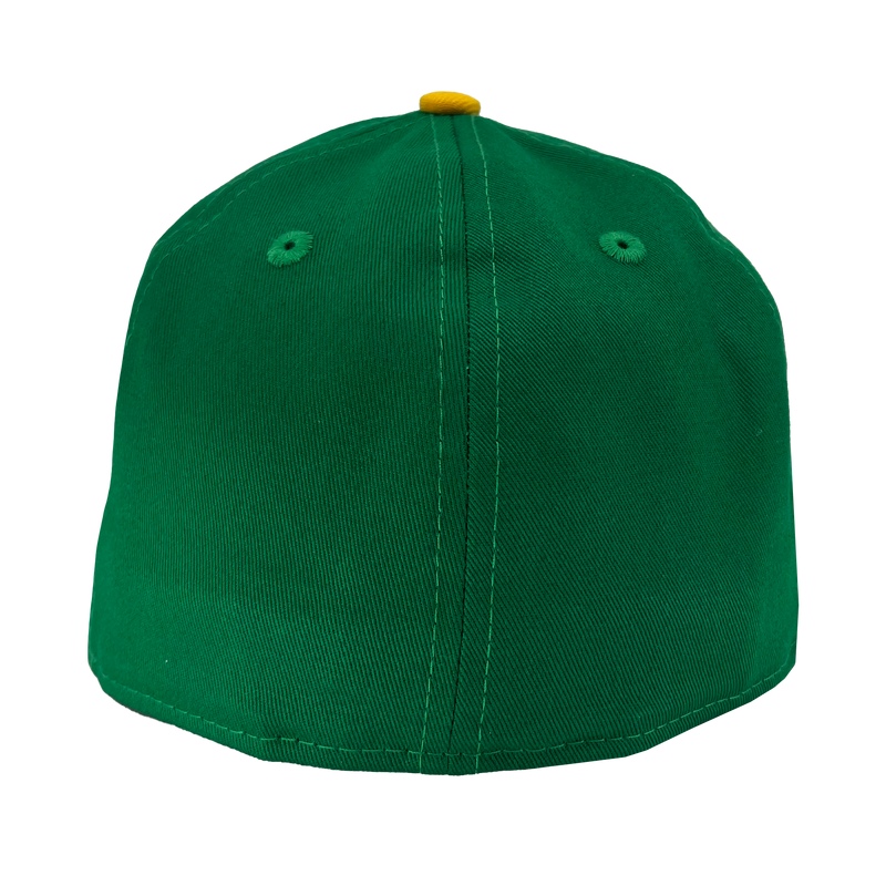 Backside of green crown with yellow button on top.