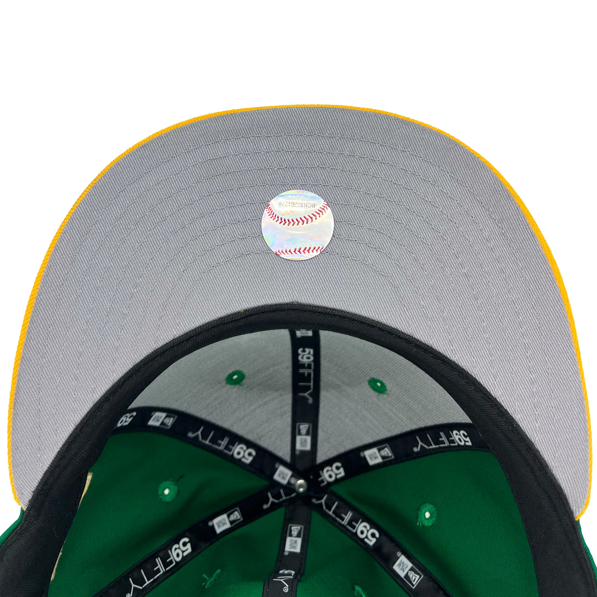 Grey underbill of New Era fitted cap with official MLB hologram emblem.
