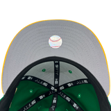 Grey underbill of New Era fitted cap with official MLB hologram emblem.